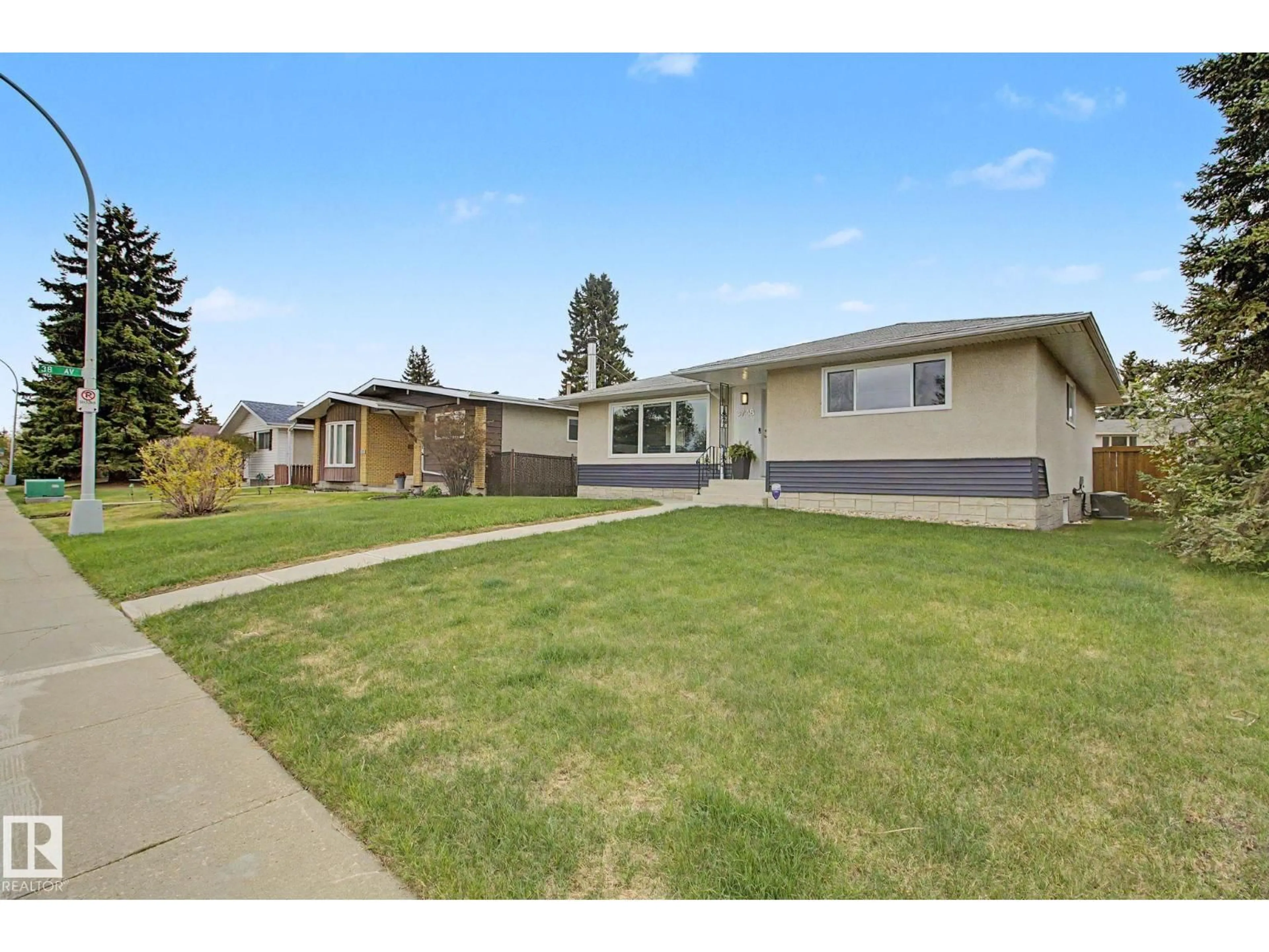 Home with vinyl exterior material, street for 3748 117 ST, Edmonton Alberta T6J1S7