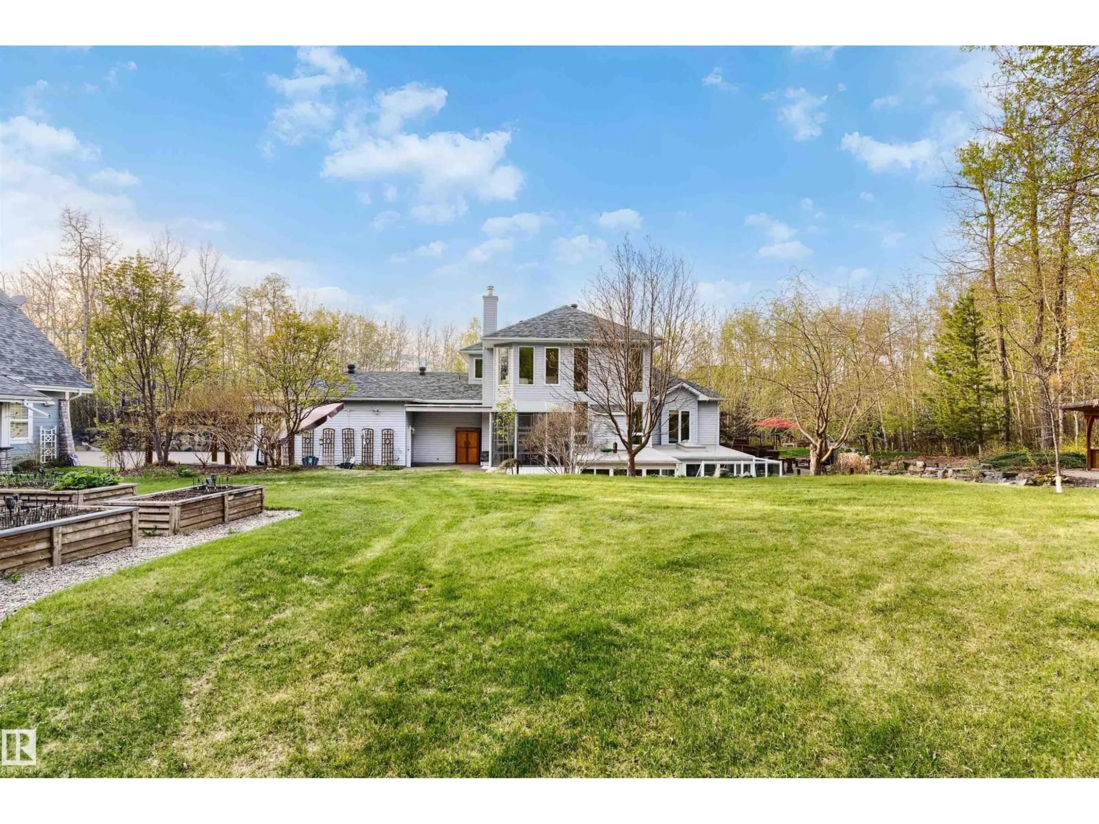 A pic from outside/outdoor area/front of a property/back of a property/a pic from drone, unknown for 25 - 52147 RGE ROAD 231, Rural Strathcona County Alberta T8B1A4