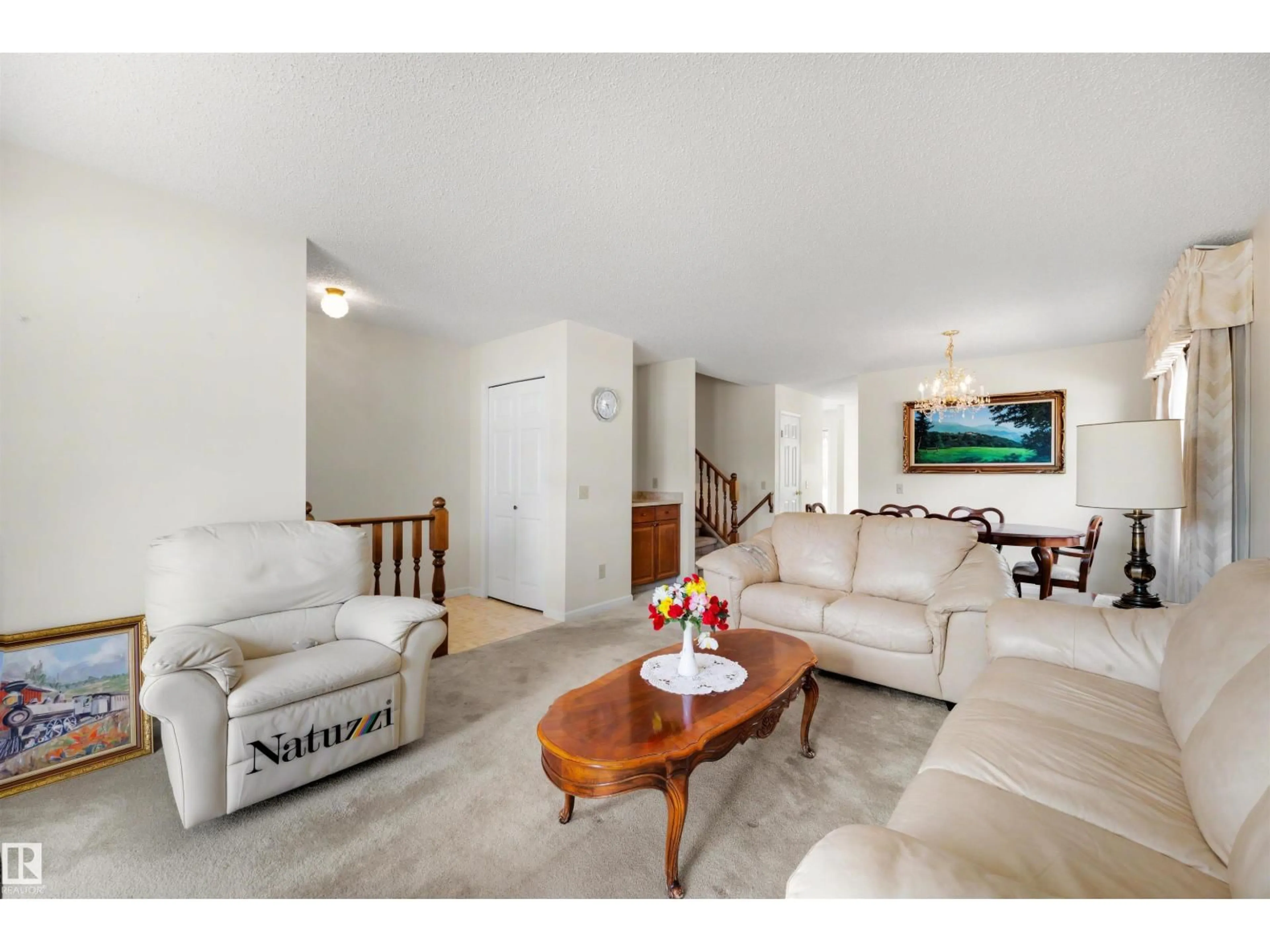 Living room with furniture, unknown for 17946 57 AV, Edmonton Alberta T6M1X3