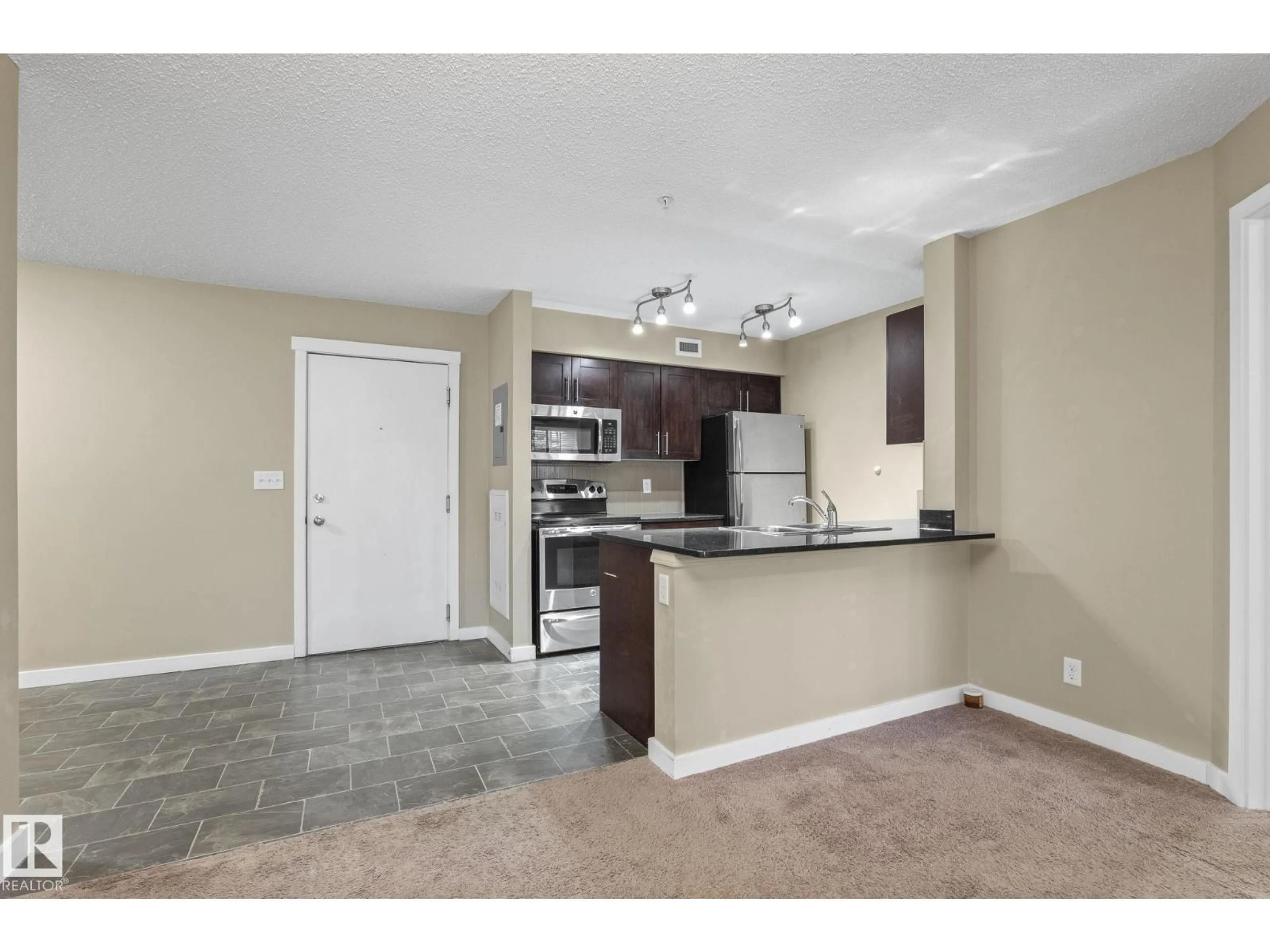 Open concept kitchen, unknown for #116 - 12025 22 AV, Edmonton Alberta T6W1J5