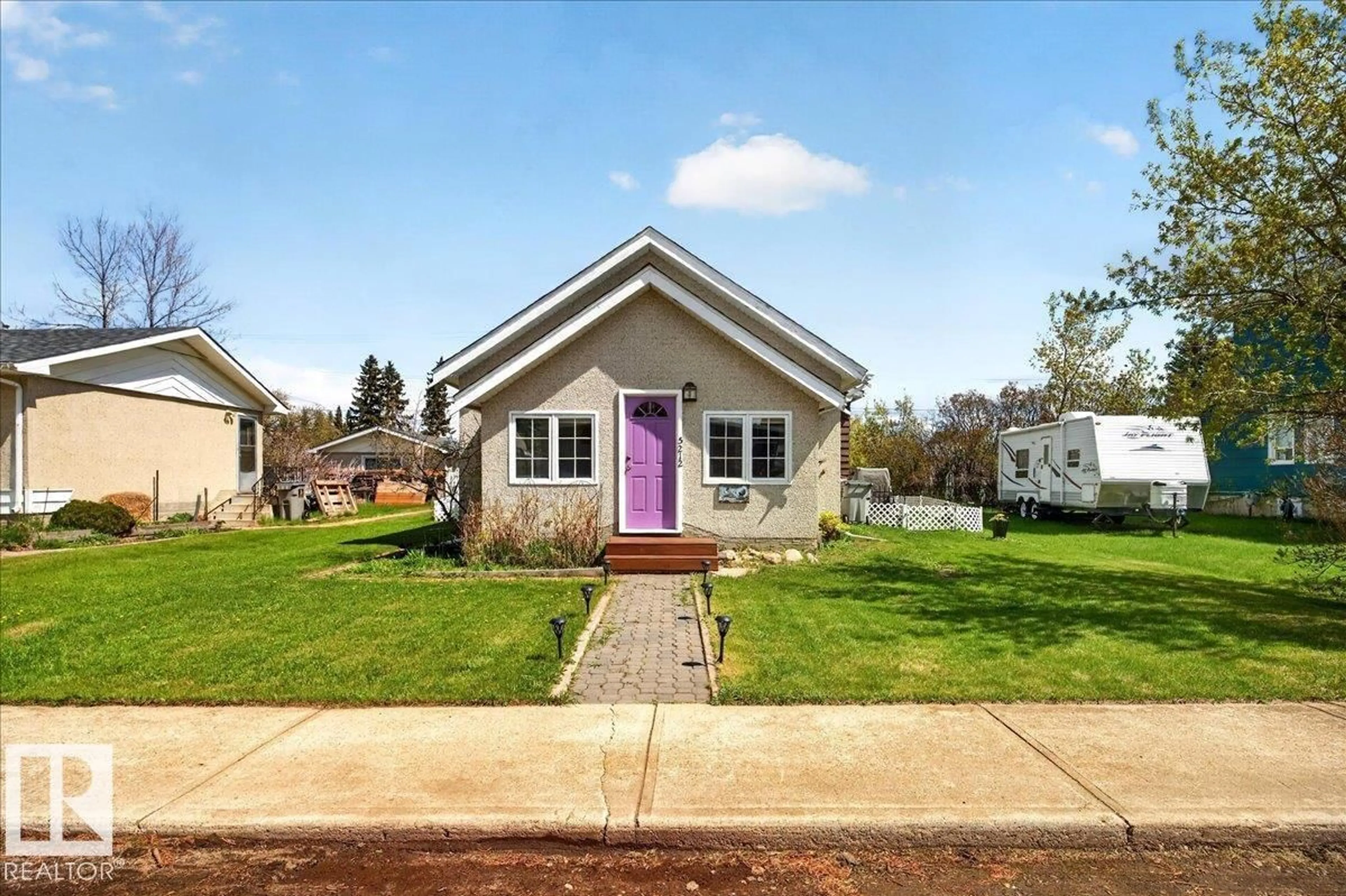 Home with vinyl exterior material, street for 5212 51 AV, Mundare Alberta T0B3H0