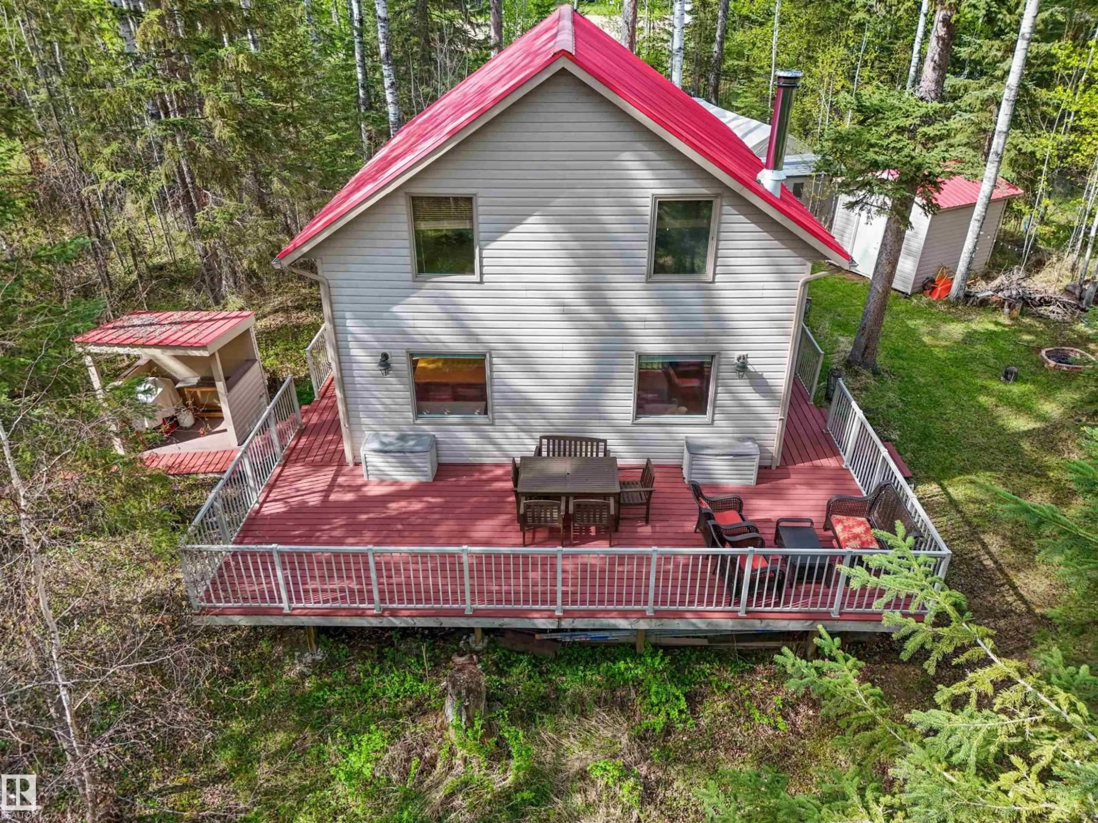 A pic from outside/outdoor area/front of a property/back of a property/a pic from drone, forest/trees view for 313 - 55061 TWP ROAD 462, Rural Wetaskiwin County Alberta T0C0T0