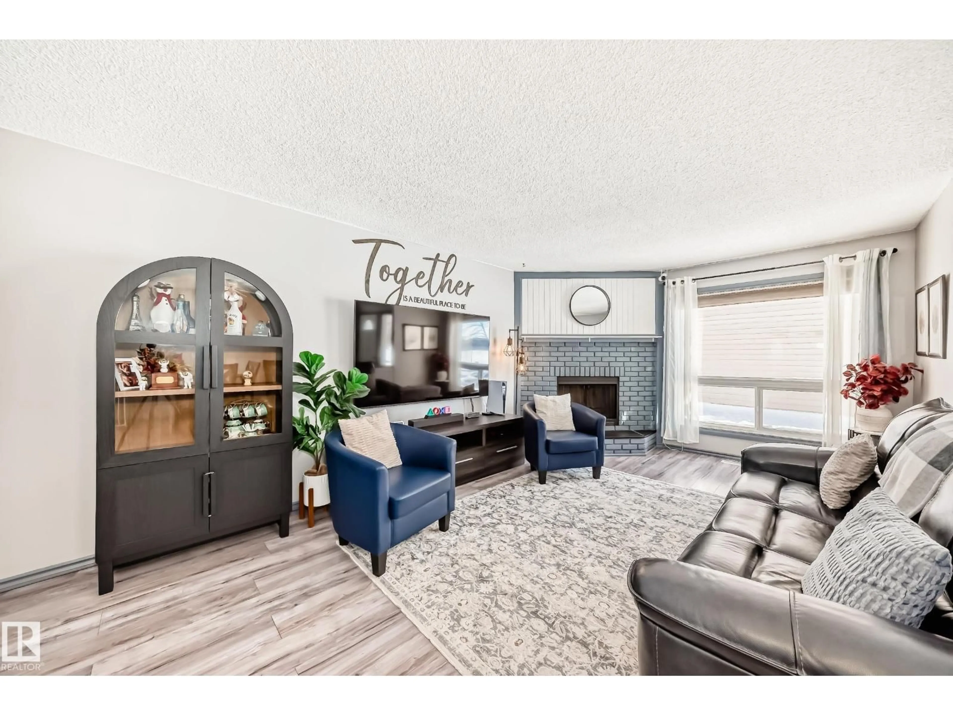 Living room with furniture, unknown for 214A WARWICK RD, Edmonton Alberta T5X4P8