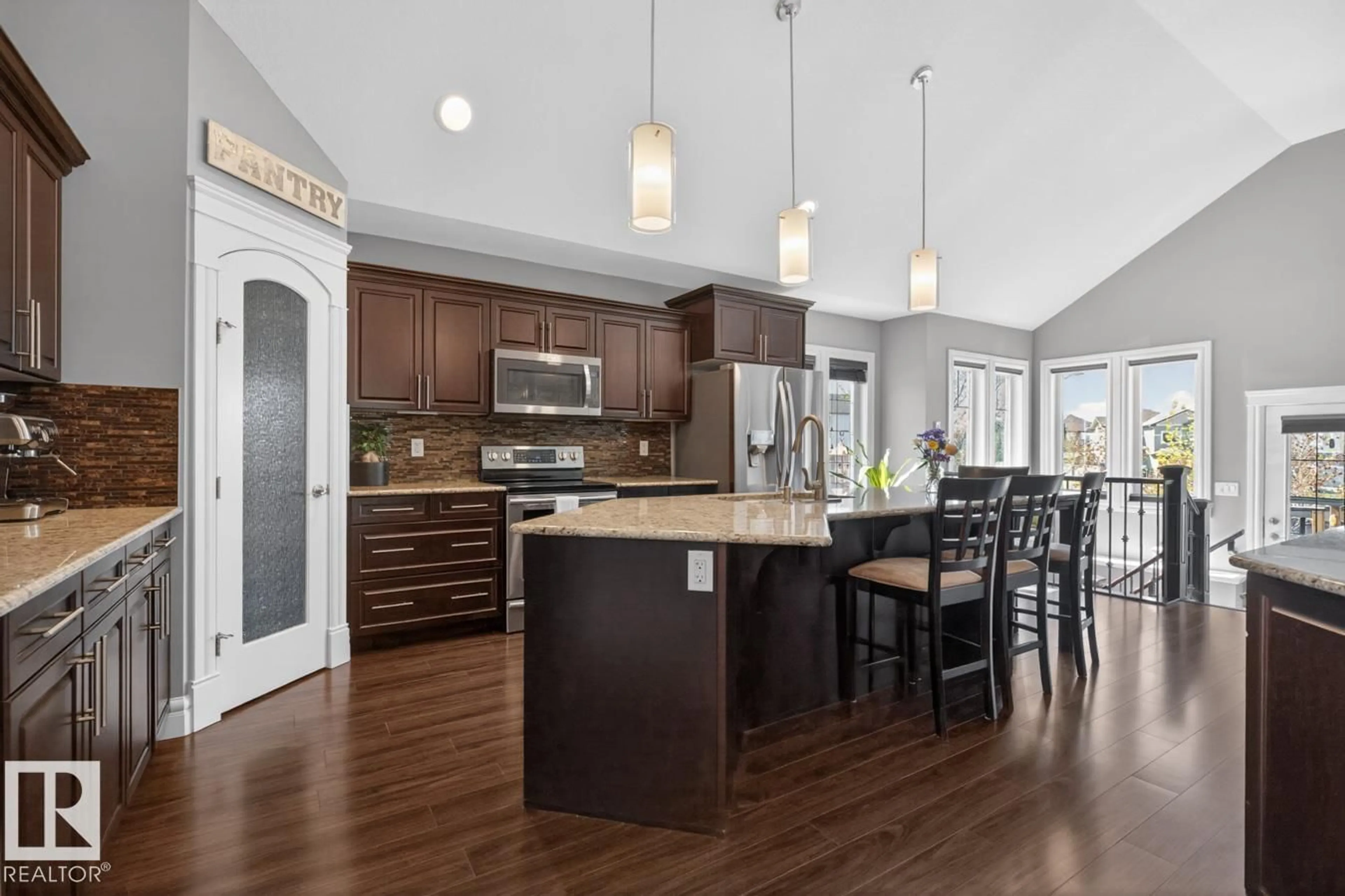 Open concept kitchen, wood/laminate floor for 301 STILL CREEK CR, Sherwood Park Alberta T8H0S7