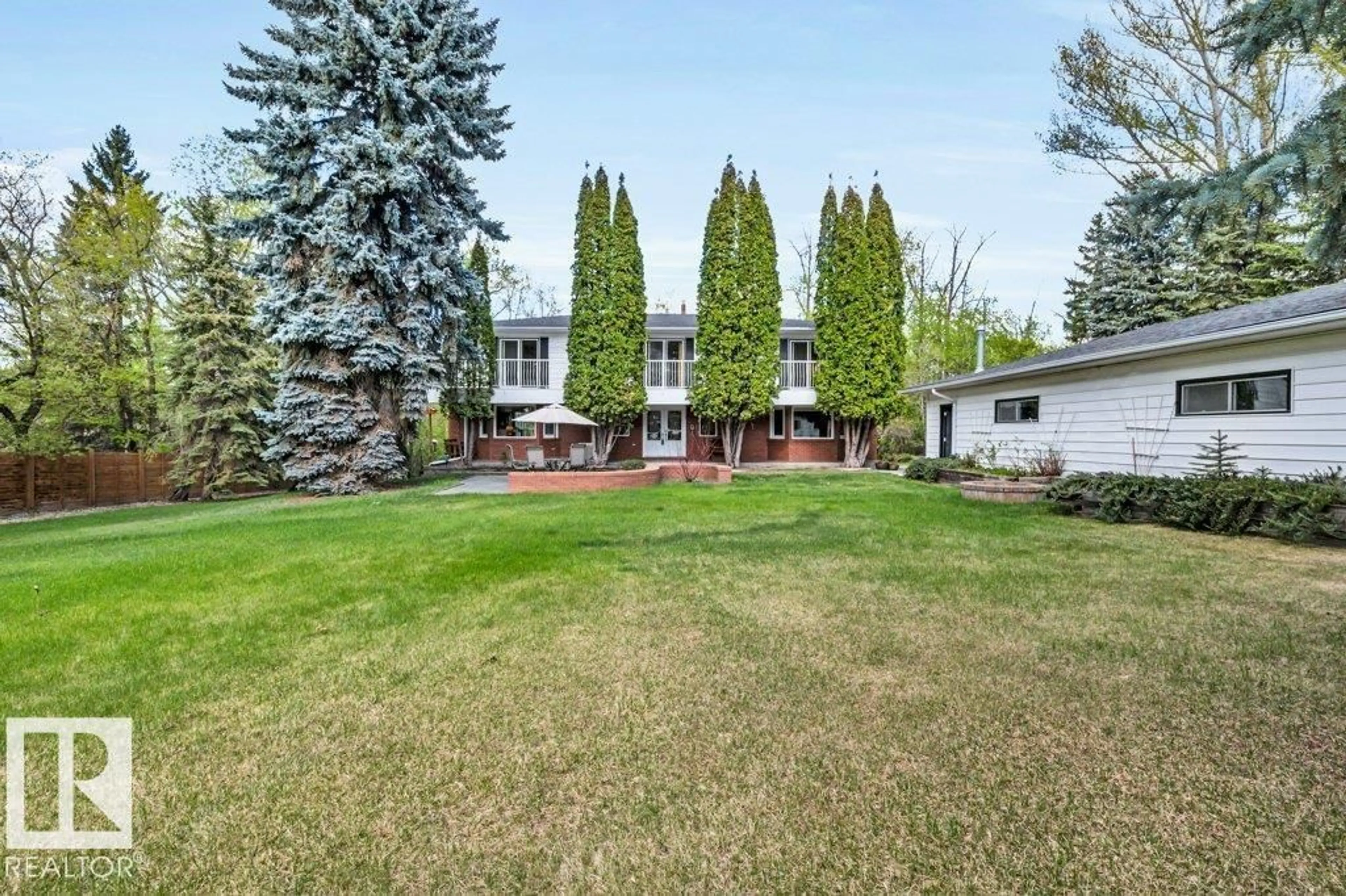 A pic from outside/outdoor area/front of a property/back of a property/a pic from drone, mountain view for 260 WINDERMERE DR, Edmonton Alberta T6W0S4