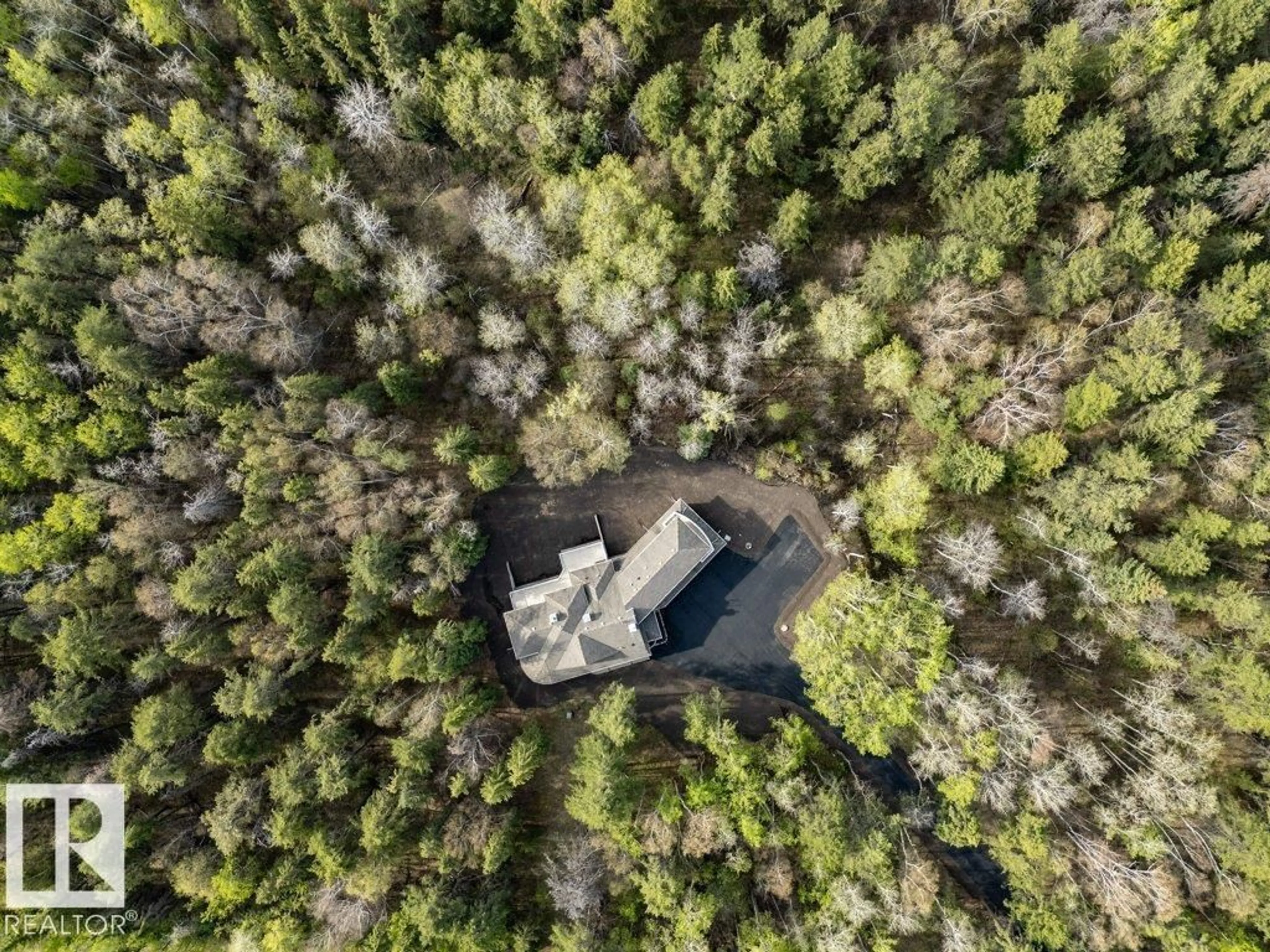 A pic from outside/outdoor area/front of a property/back of a property/a pic from drone, forest/trees view for 26410 TWP RD 512, Rural Parkland County Alberta T7Y1E7