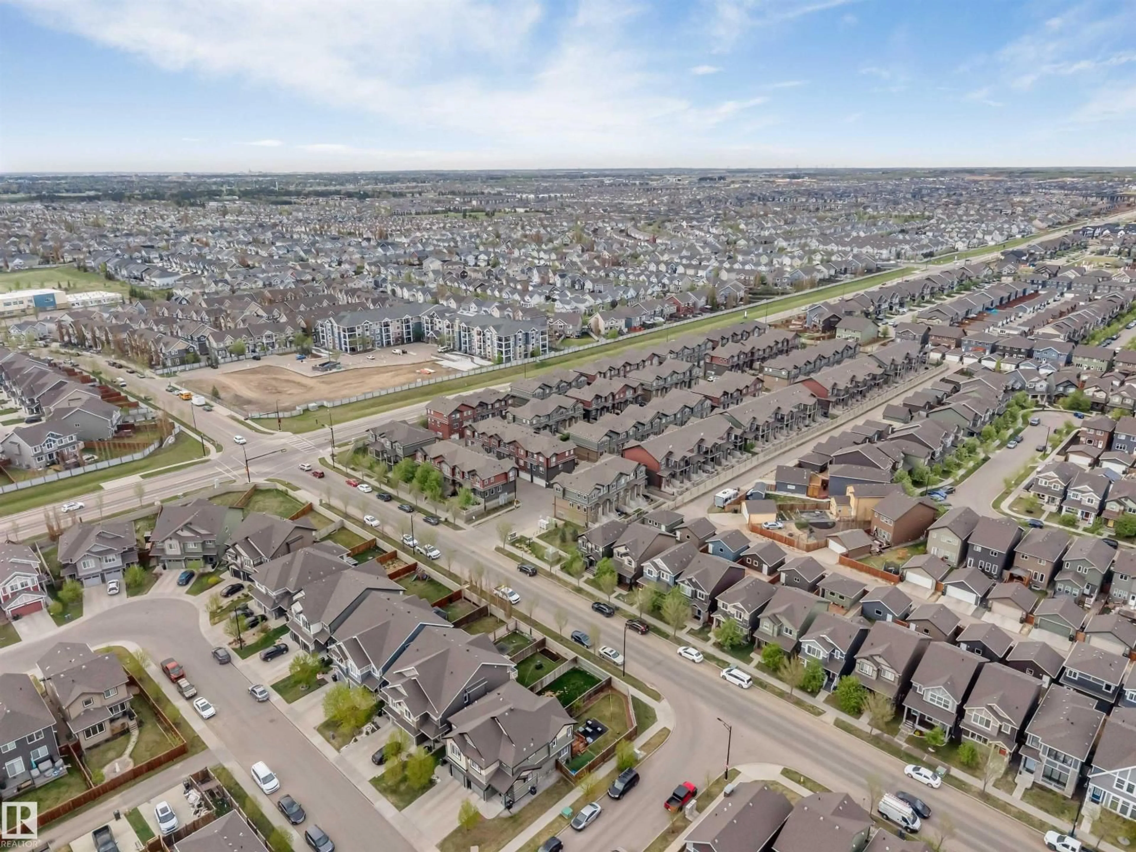 A pic from outside/outdoor area/front of a property/back of a property/a pic from drone, street for #30 - 3305 ORCHARDS LI, Edmonton Alberta T6X2H1