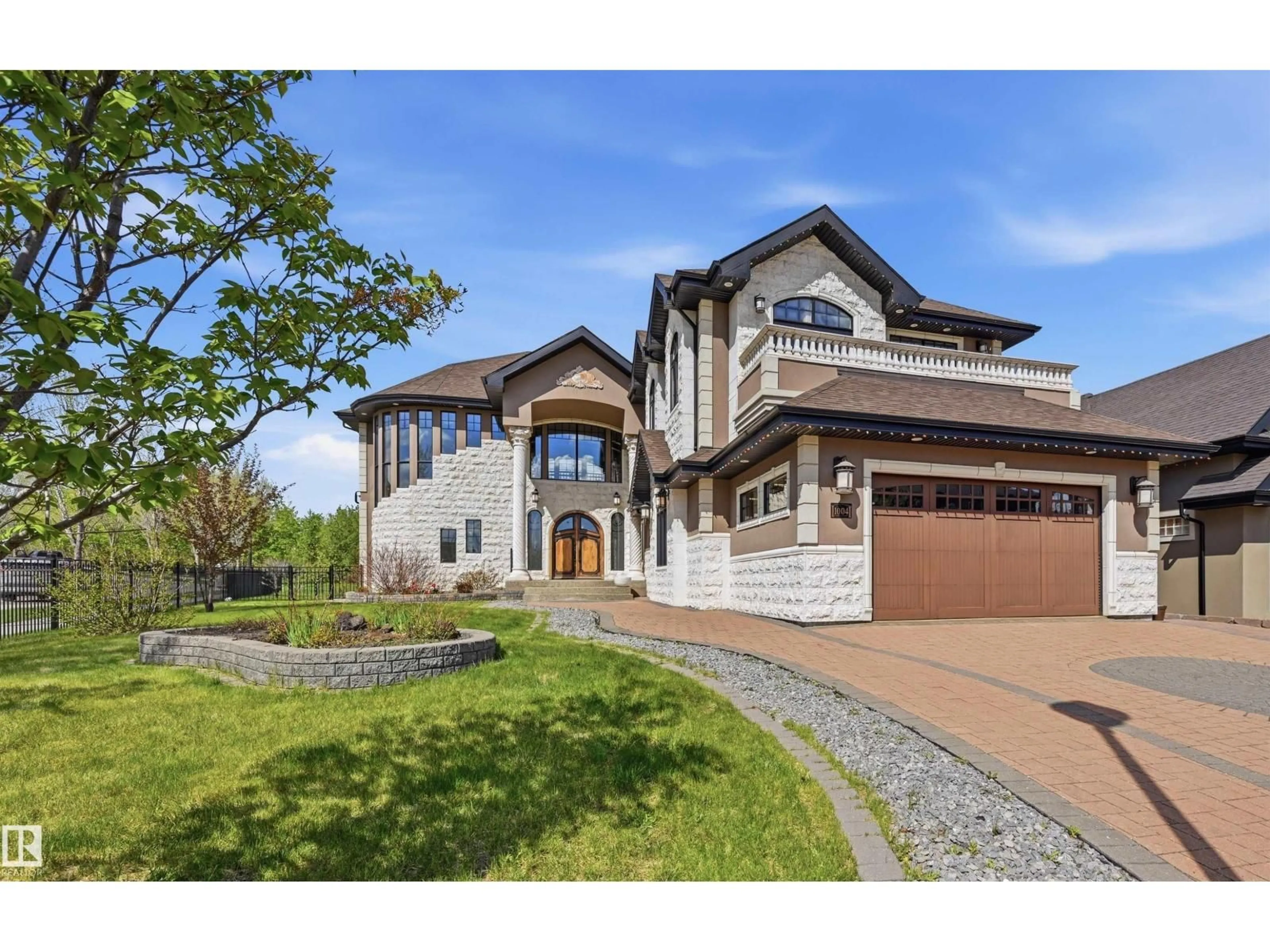 Home with brick exterior material, street for 1004 HOLLANDS PT, Edmonton Alberta T6R3T1