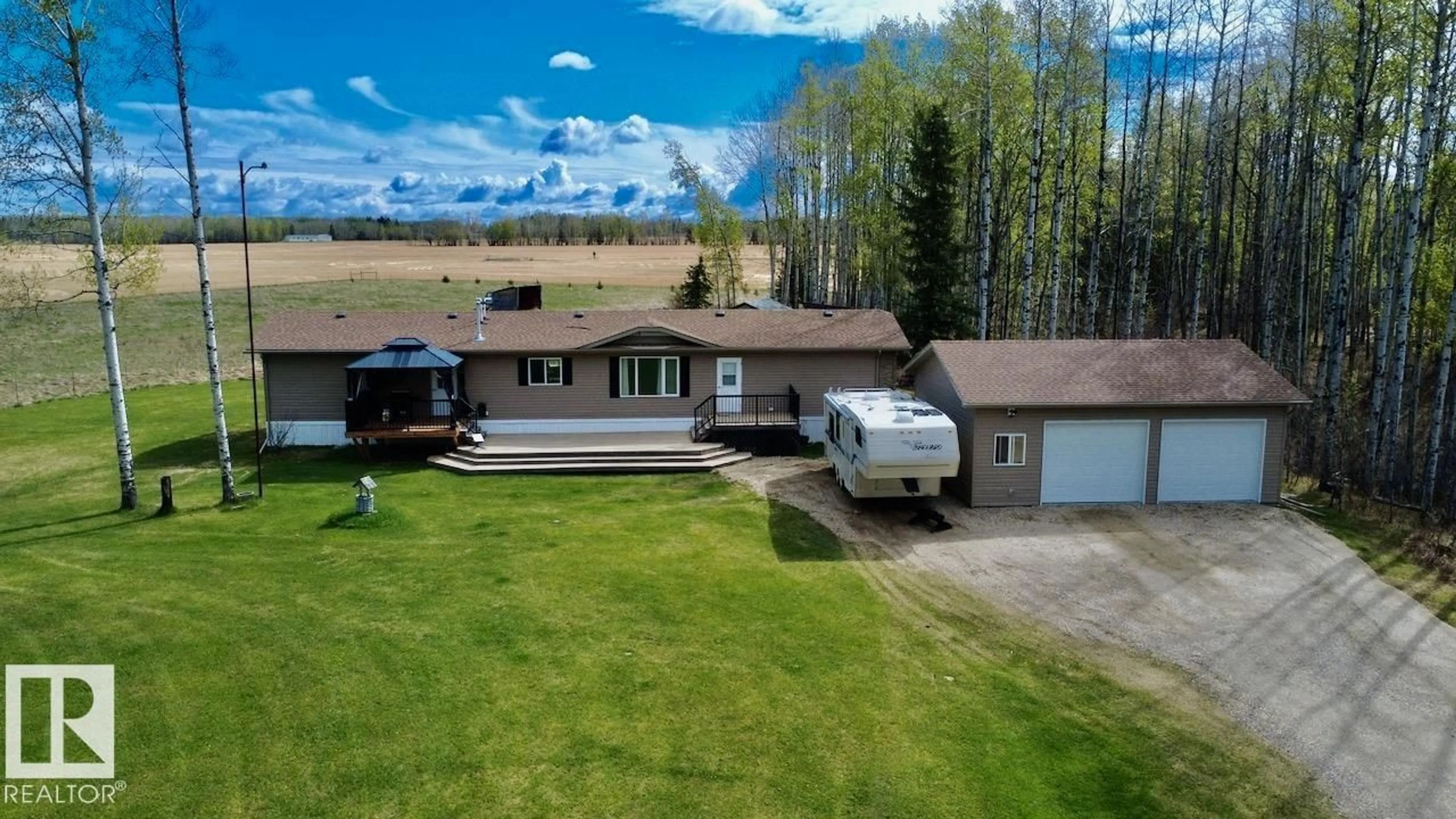 A pic from outside/outdoor area/front of a property/back of a property/a pic from drone, mountain view for 49517 RANGE ROAD 90, Rural Brazeau County Alberta T7A2A3