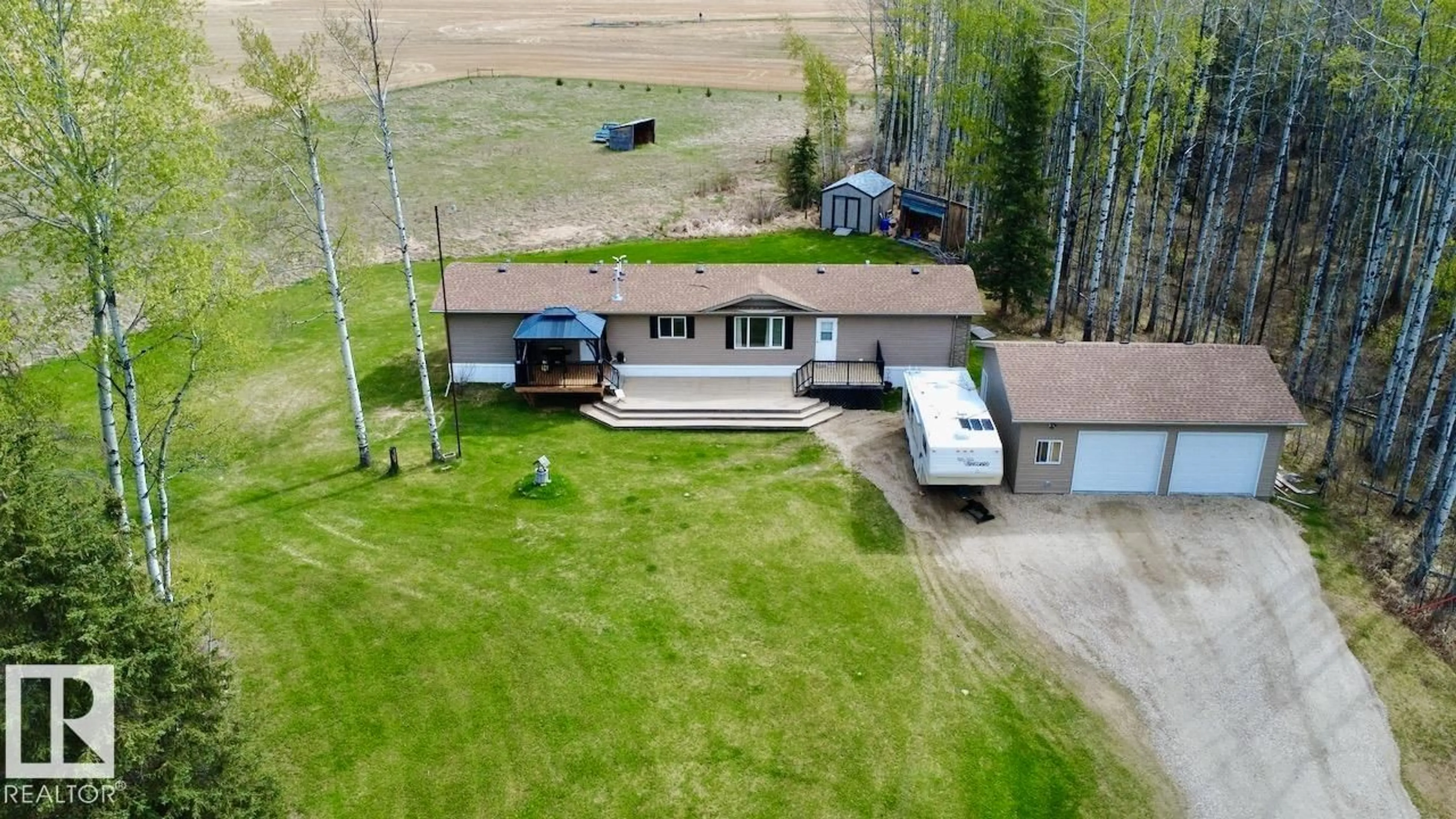 A pic from outside/outdoor area/front of a property/back of a property/a pic from drone, unknown for 49517 RANGE ROAD 90, Rural Brazeau County Alberta T7A2A3
