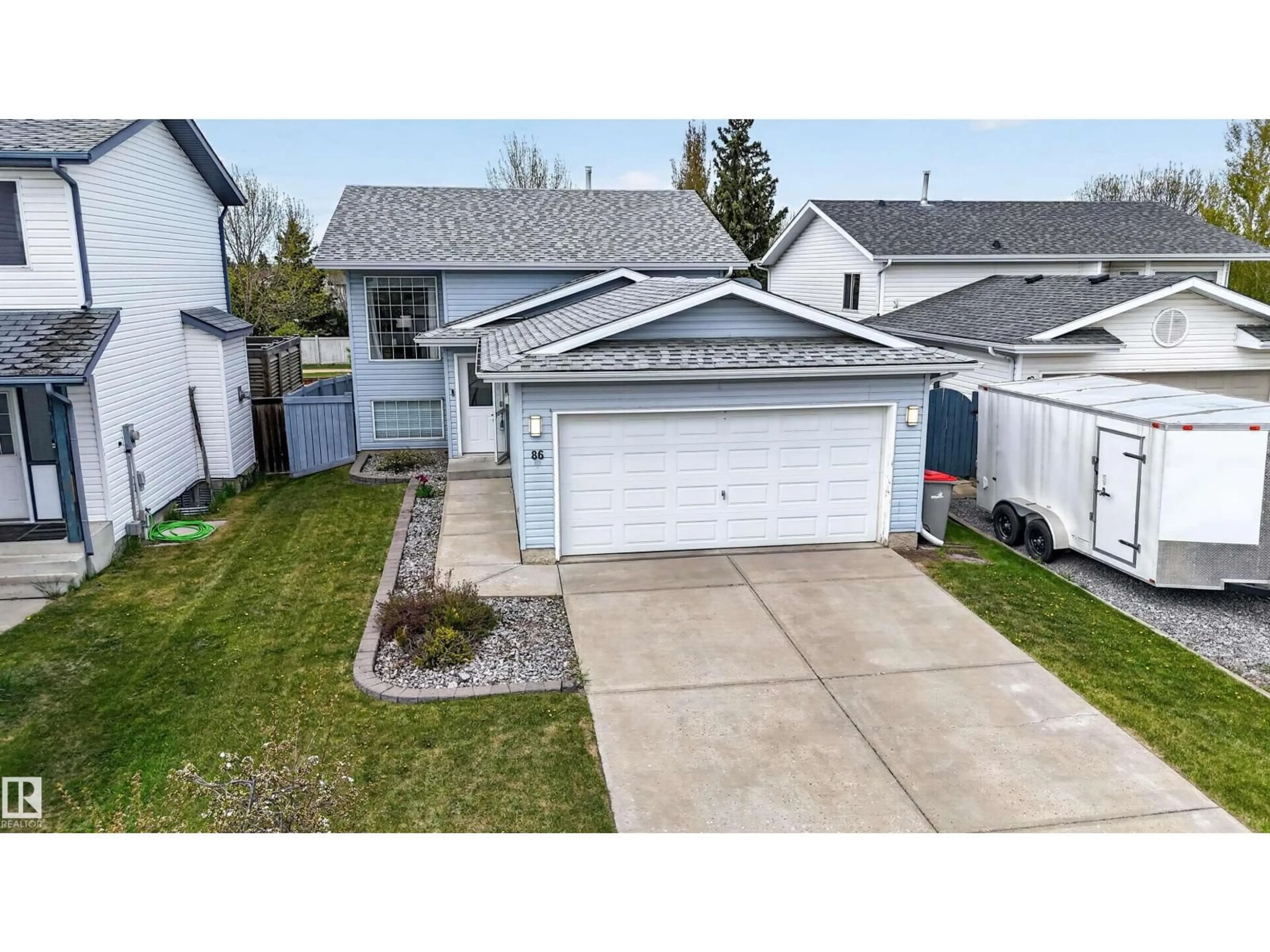 A pic from outside/outdoor area/front of a property/back of a property/a pic from drone, street for 86 LA COSTA FAIRWAY CL, Stony Plain Alberta T7Z2A5