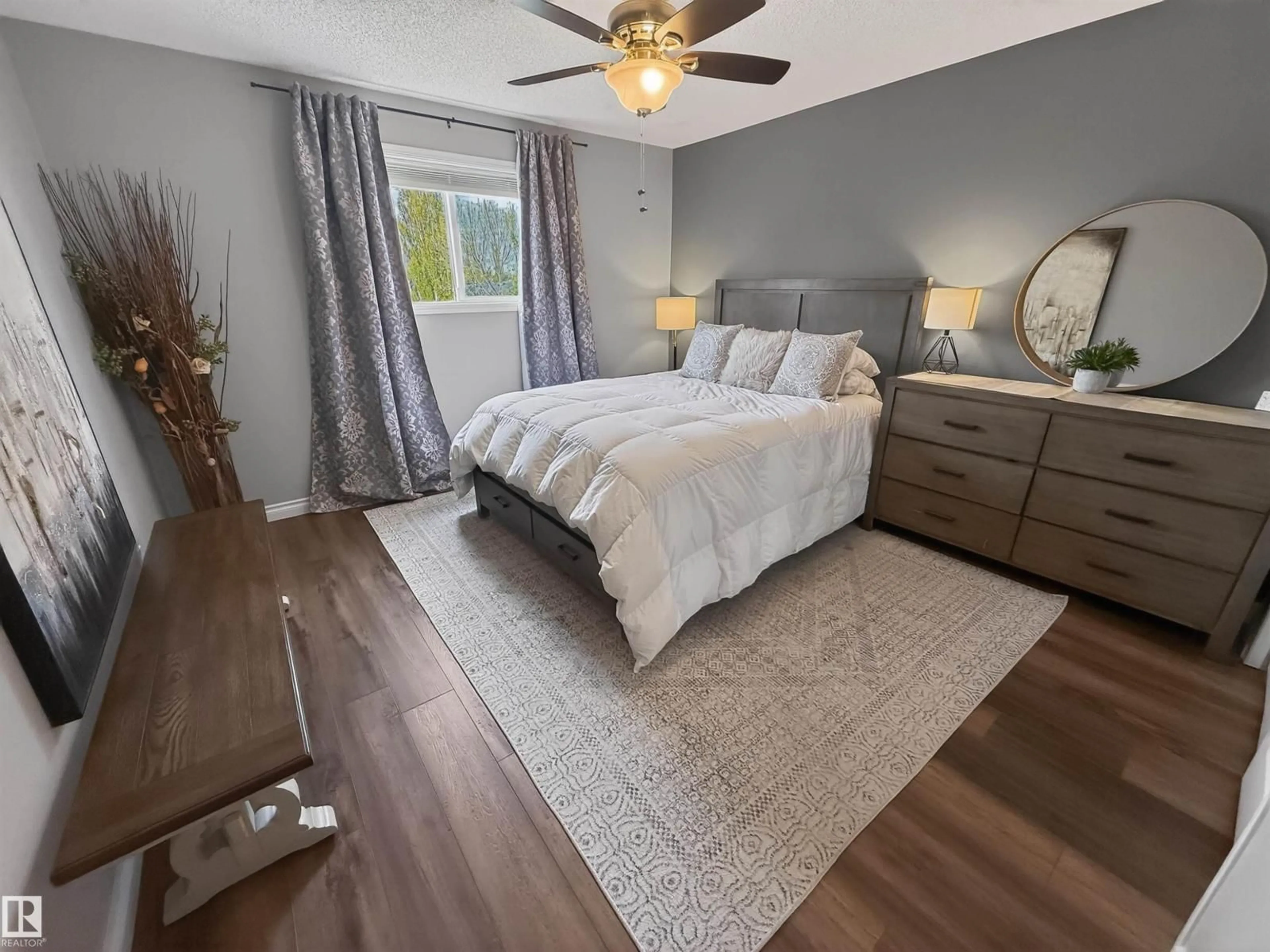 Bedroom with bed, wood/laminate floor for 86 LA COSTA FAIRWAY CL, Stony Plain Alberta T7Z2A5