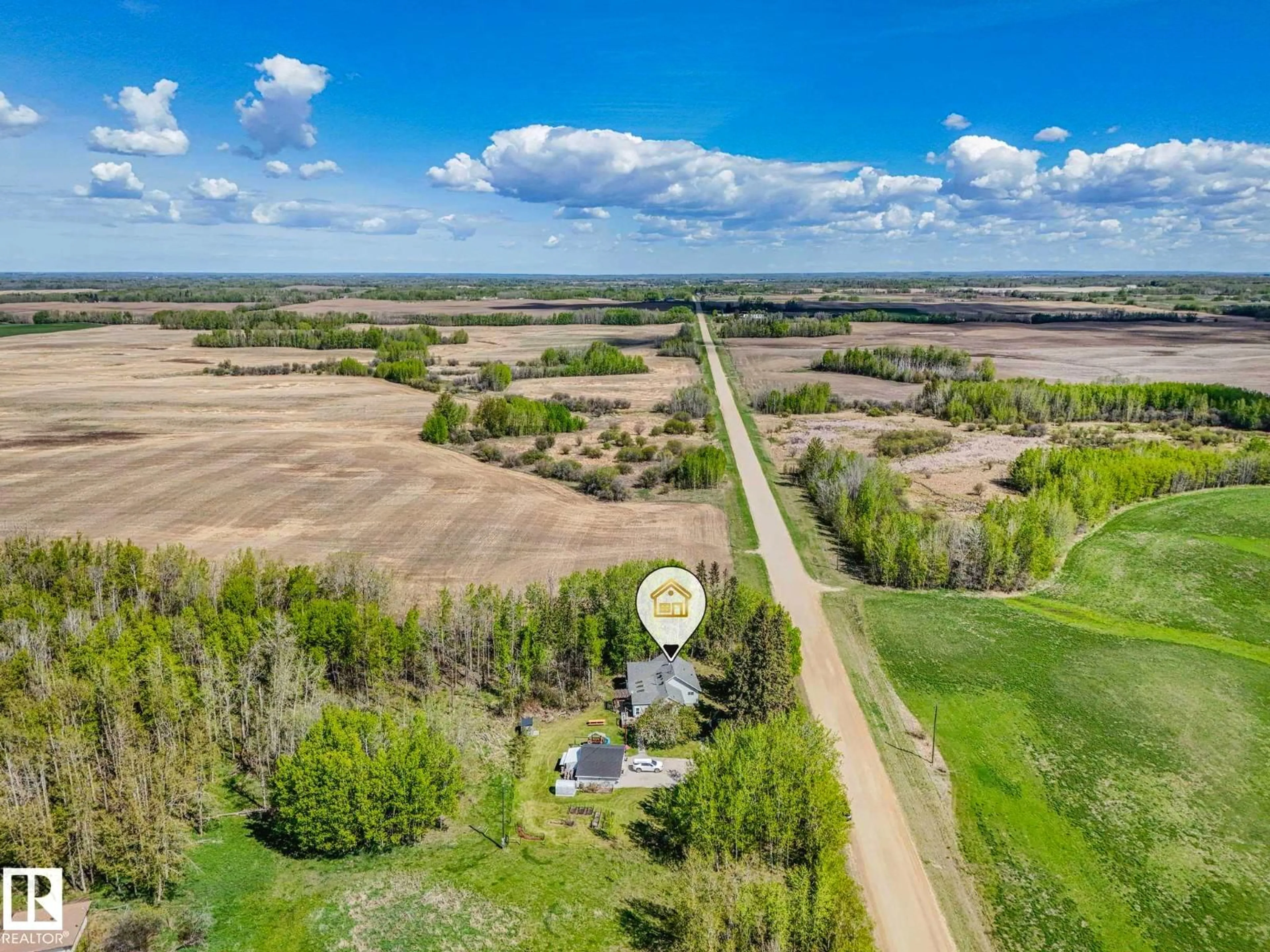 A pic from outside/outdoor area/front of a property/back of a property/a pic from drone, water/lake/river/ocean view for 51026 RGE ROAD 20, Rural Parkland County Alberta T7Y2G2
