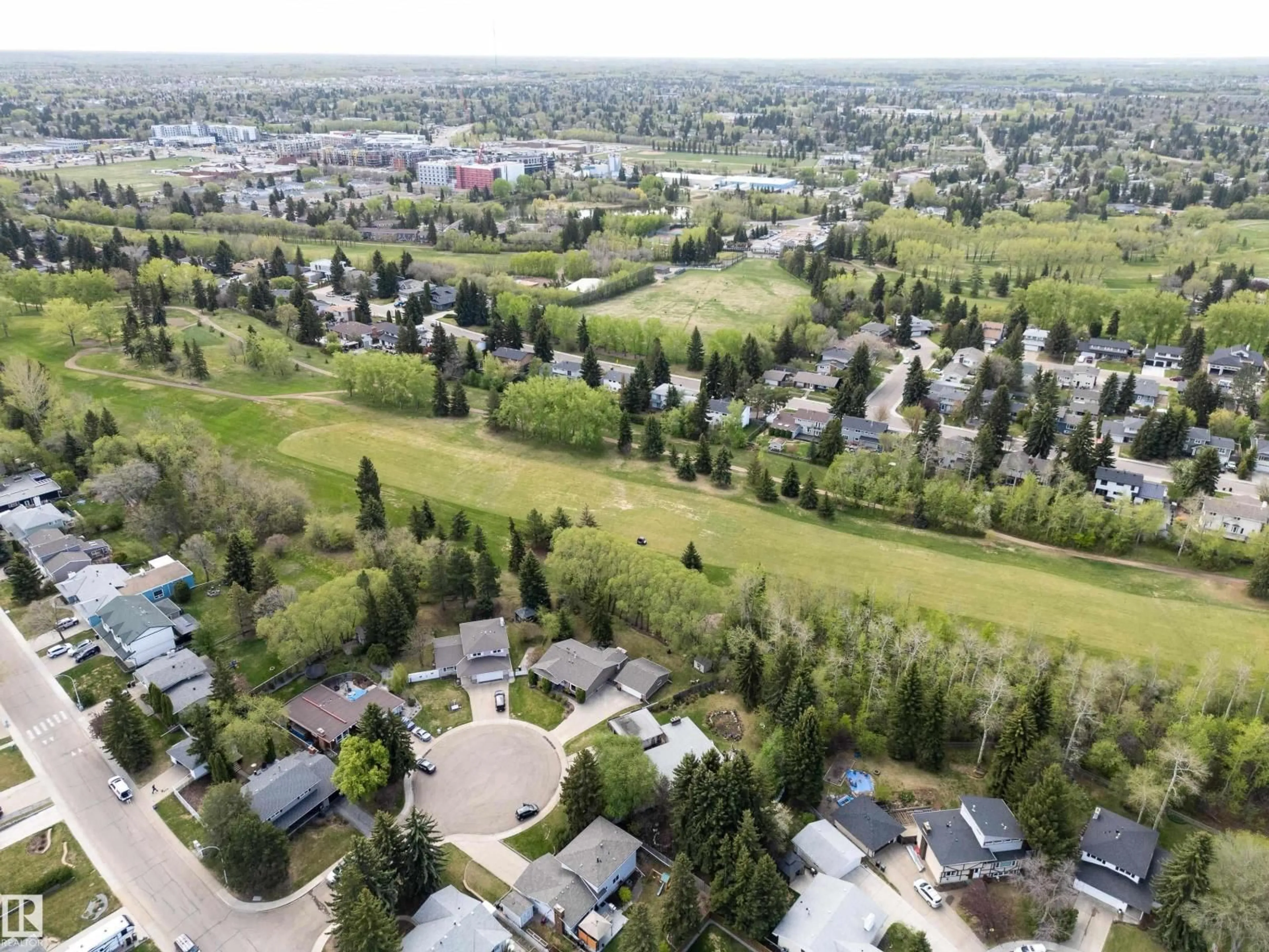 A pic from outside/outdoor area/front of a property/back of a property/a pic from drone, mountain view for 205 MANOR CO, Sherwood Park Alberta T8A0S8