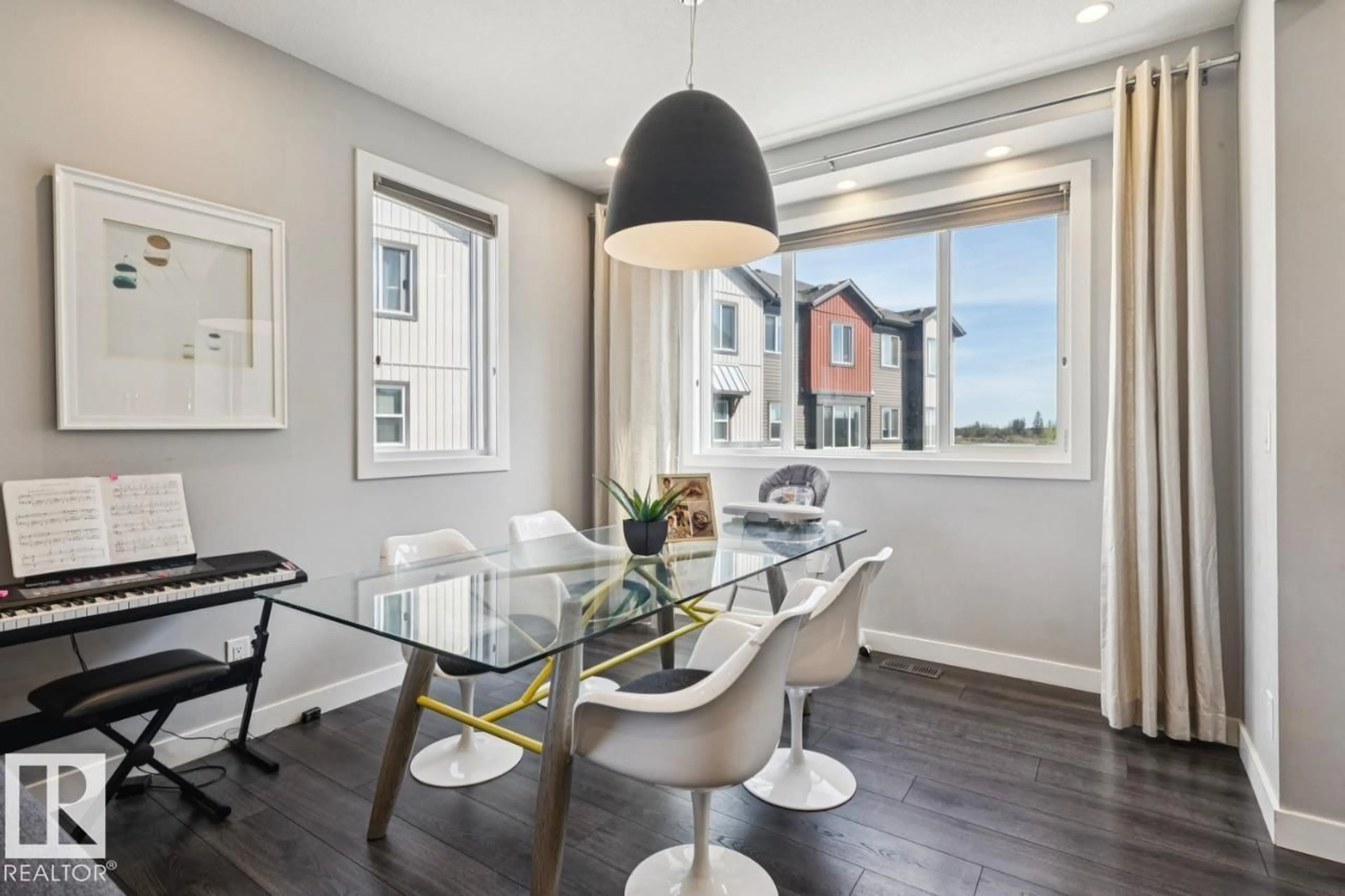 Dining room, wood/laminate floor for 45 - 16903 68 ST, Edmonton Alberta T5Z0R1