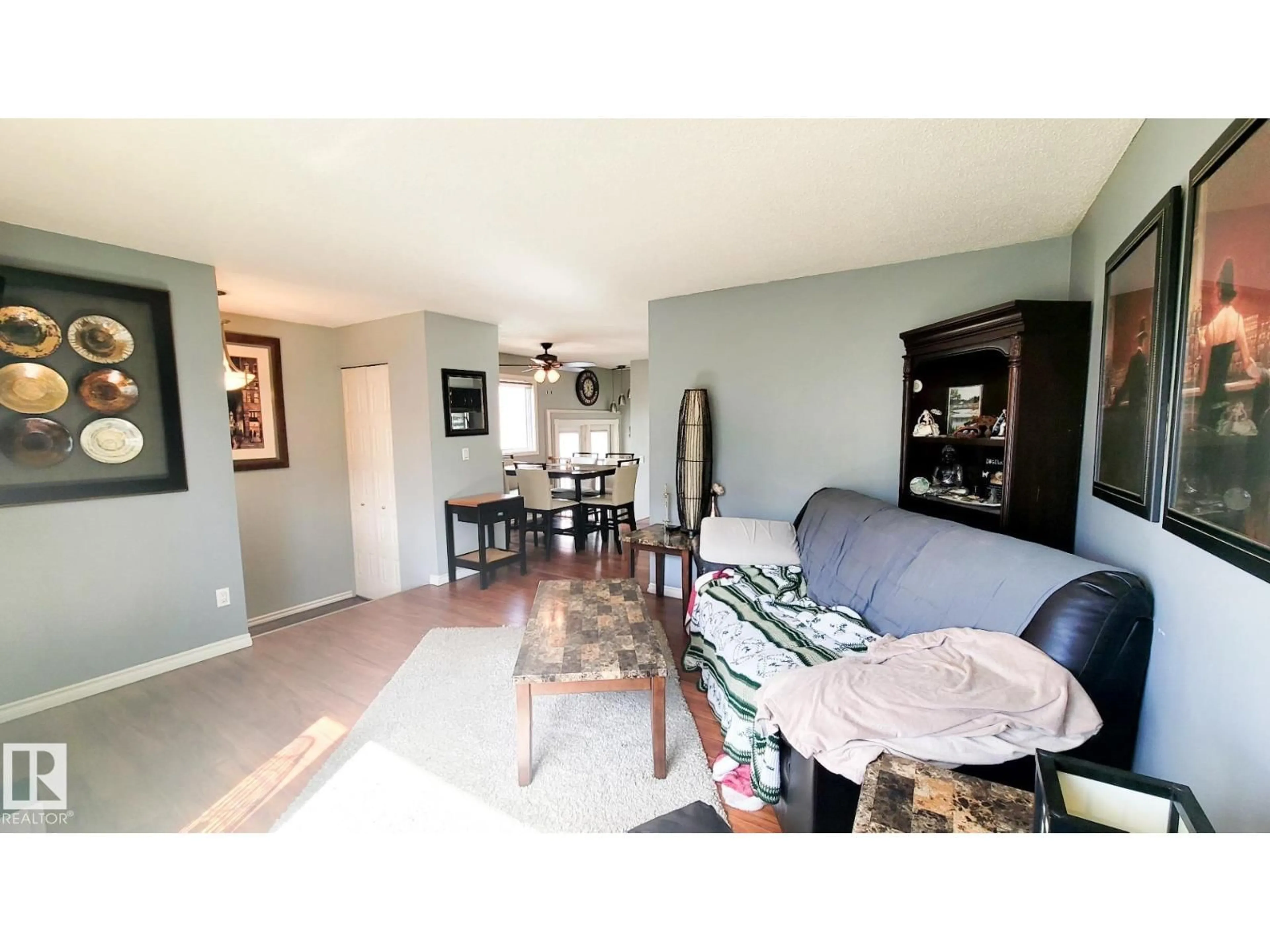 Living room with furniture, wood/laminate floor for 18 WESTBEND ST, Spruce Grove Alberta T7X1W3