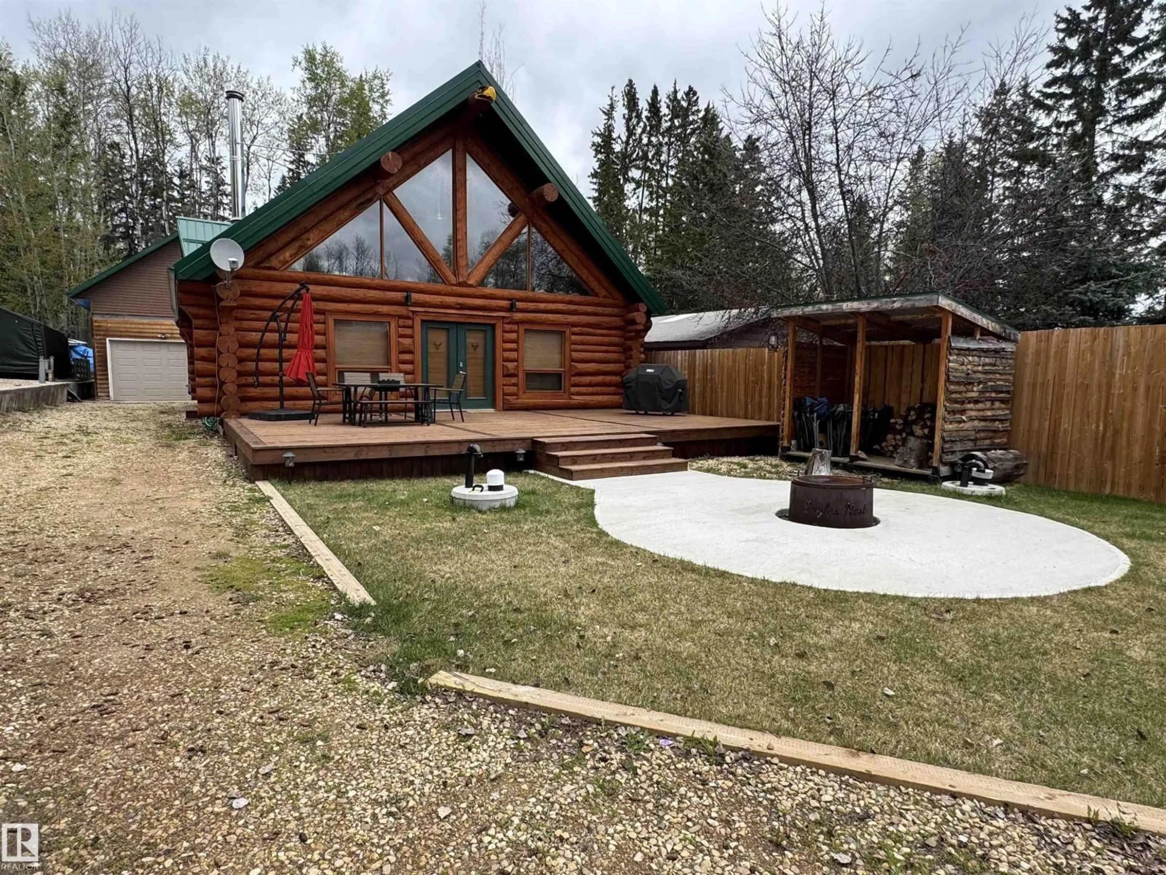 A pic from outside/outdoor area/front of a property/back of a property/a pic from drone, mountain view for 68 63116 RGE ROAD 255, Rural Westlock County Alberta T0G2J0