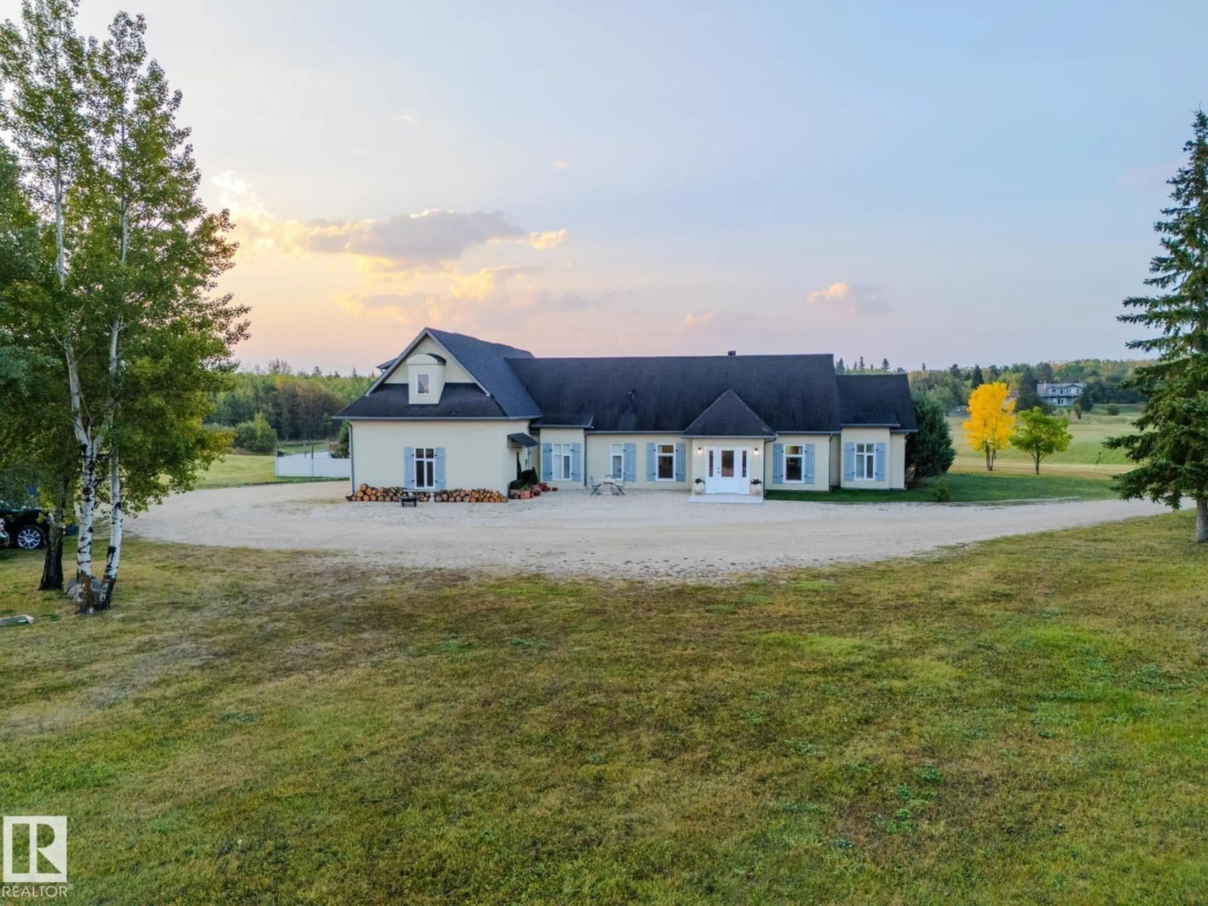 A pic from outside/outdoor area/front of a property/back of a property/a pic from drone, building for 22250 TWP ROAD 512, Rural Strathcona County Alberta T8C1H2