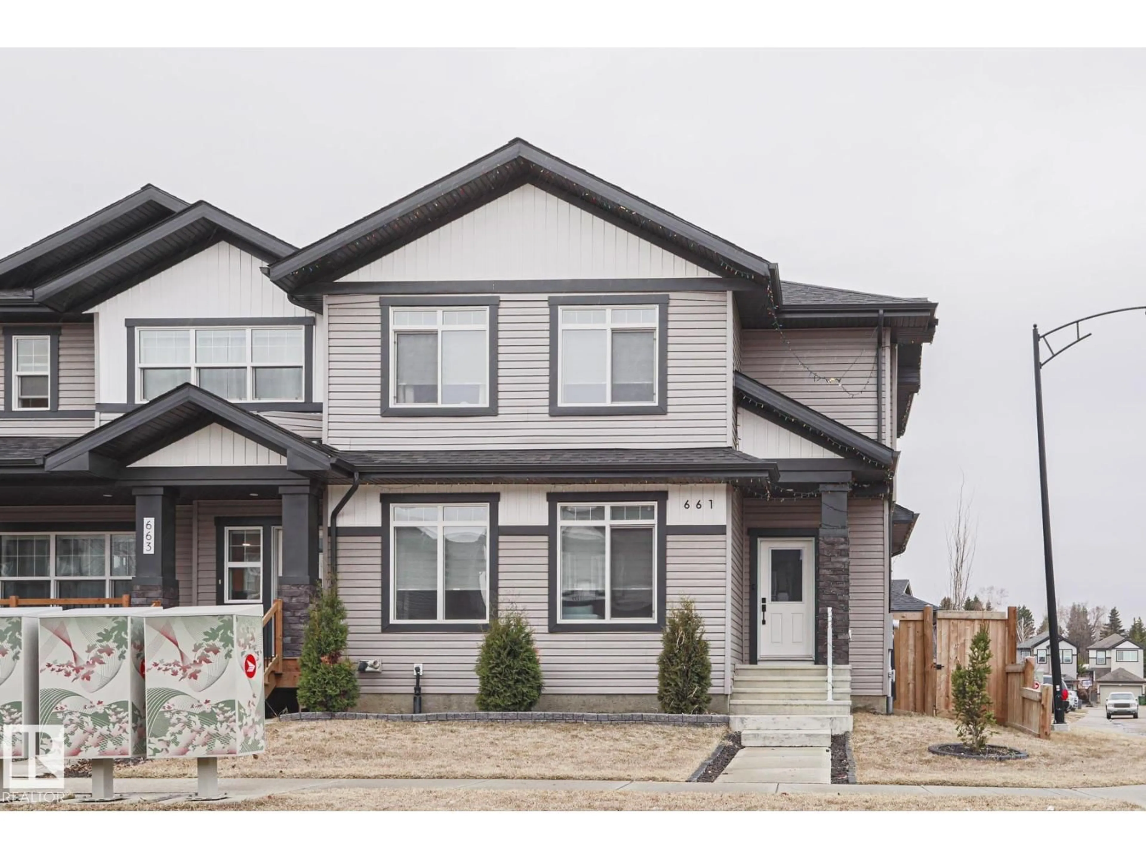 Home with vinyl exterior material, street for 661 LEWIS GREENS DR, Edmonton Alberta T5T7G3