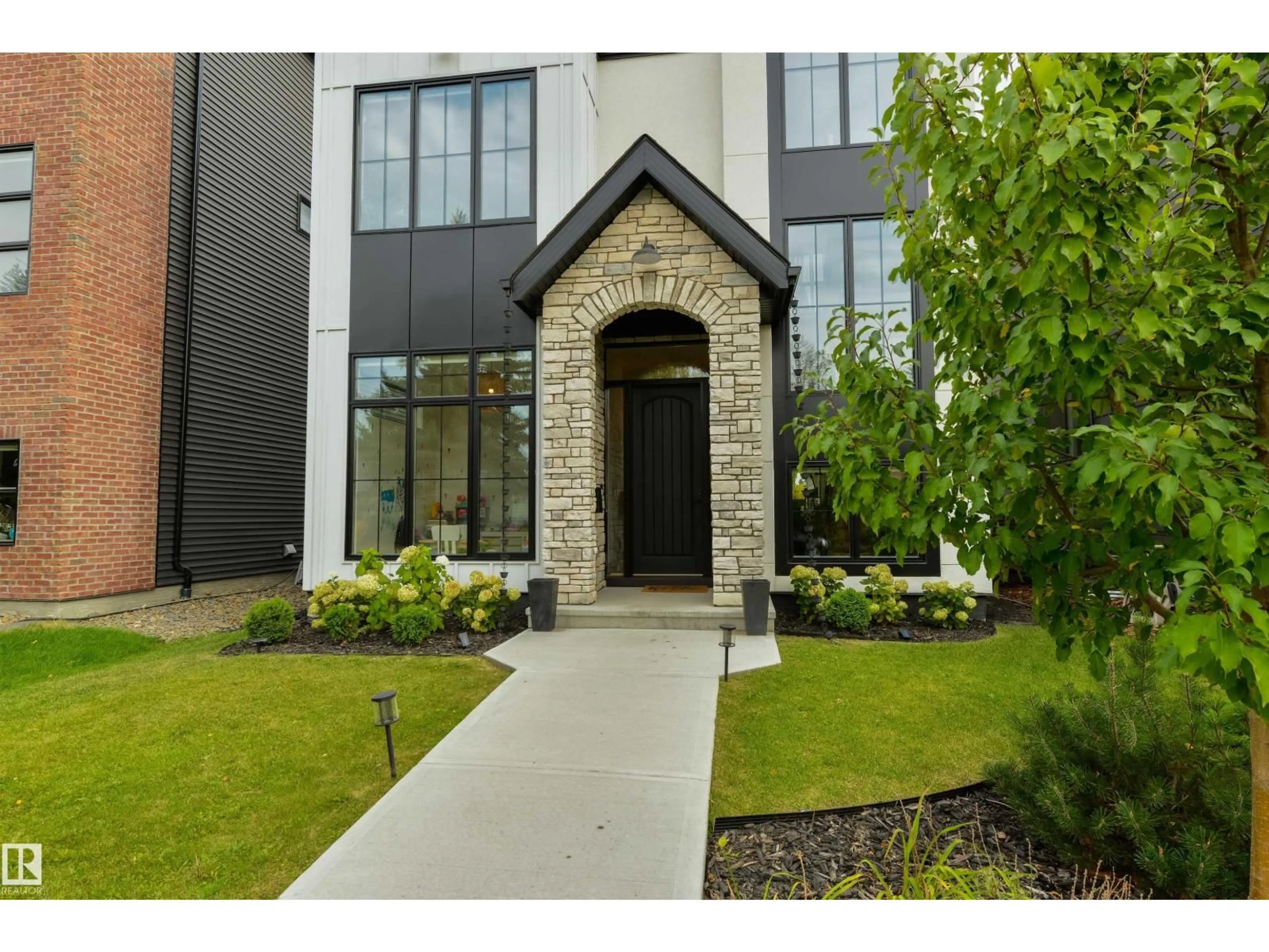 Home with brick exterior material, street for 8107 144 ST, Edmonton Alberta T5R0R3