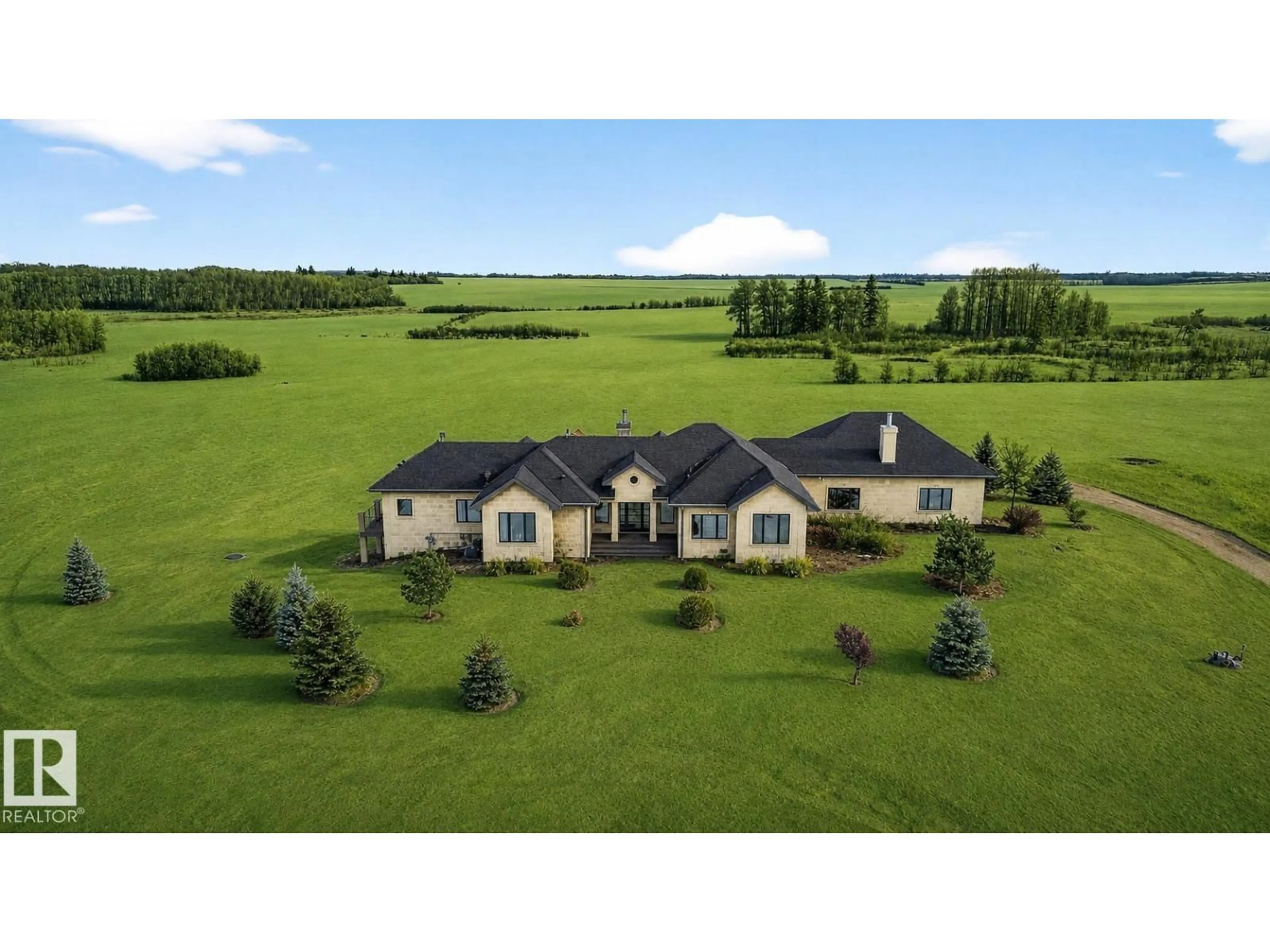 A pic from outside/outdoor area/front of a property/back of a property/a pic from drone, mountain view for 56229 RGE ROAD 242, Rural Sturgeon County Alberta T0A0K3