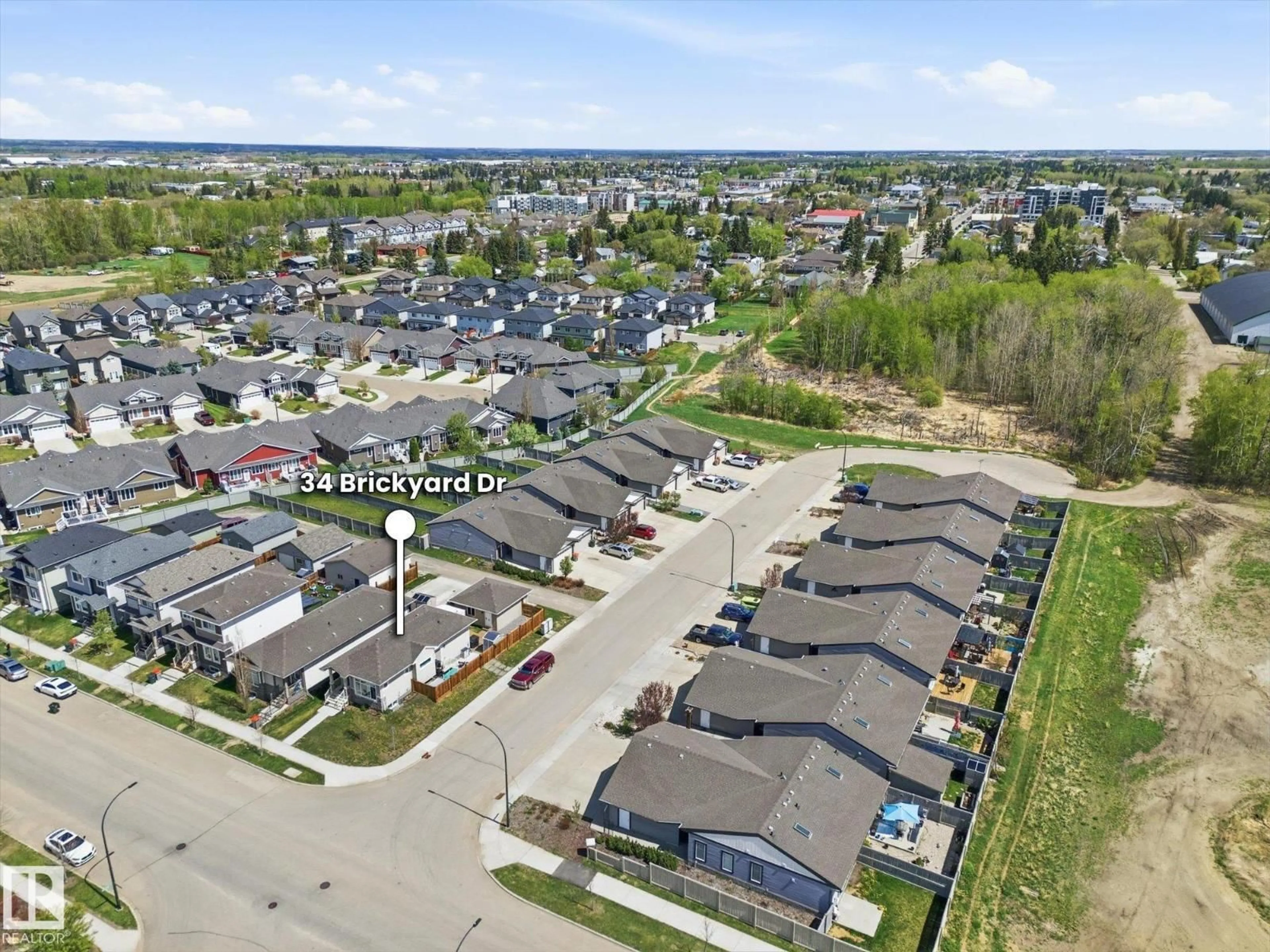 A pic from outside/outdoor area/front of a property/back of a property/a pic from drone, street for 34 BRICKYARD DR, Stony Plain Alberta T7Z0L2