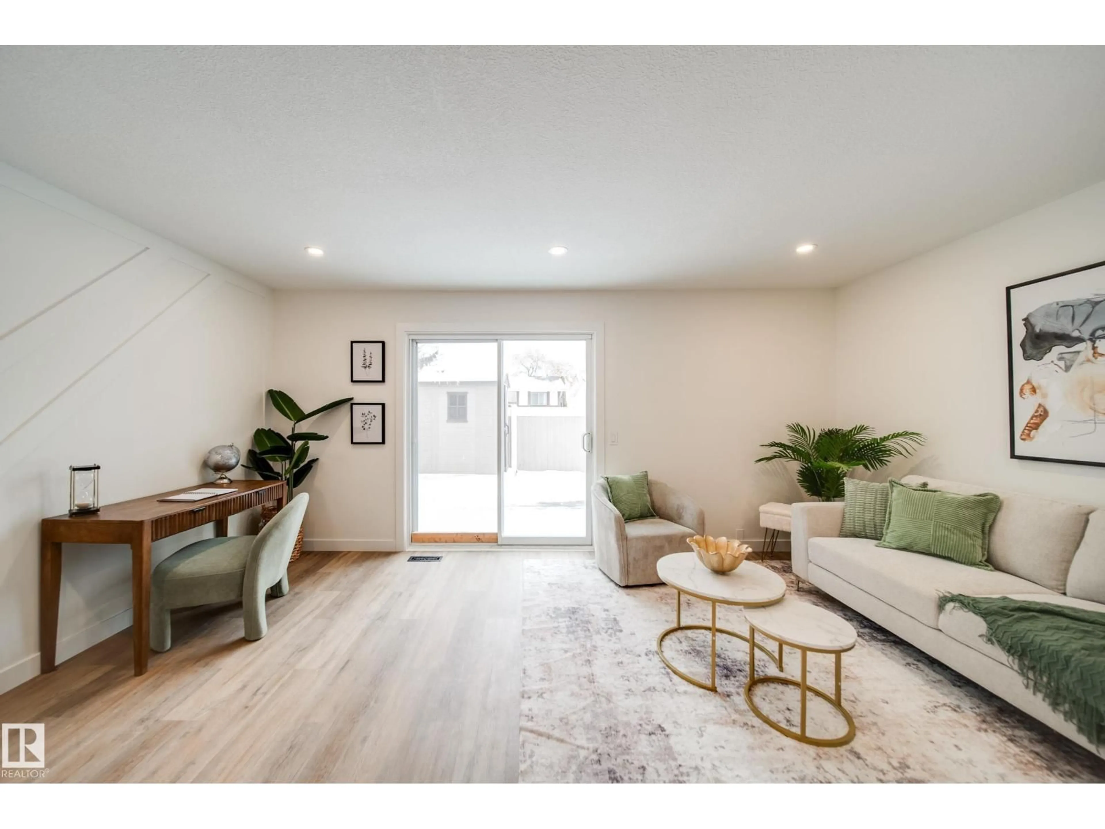 Living room with furniture, wood/laminate floor for 125 WOODBOROUGH WY, Edmonton Alberta T5Y1N2