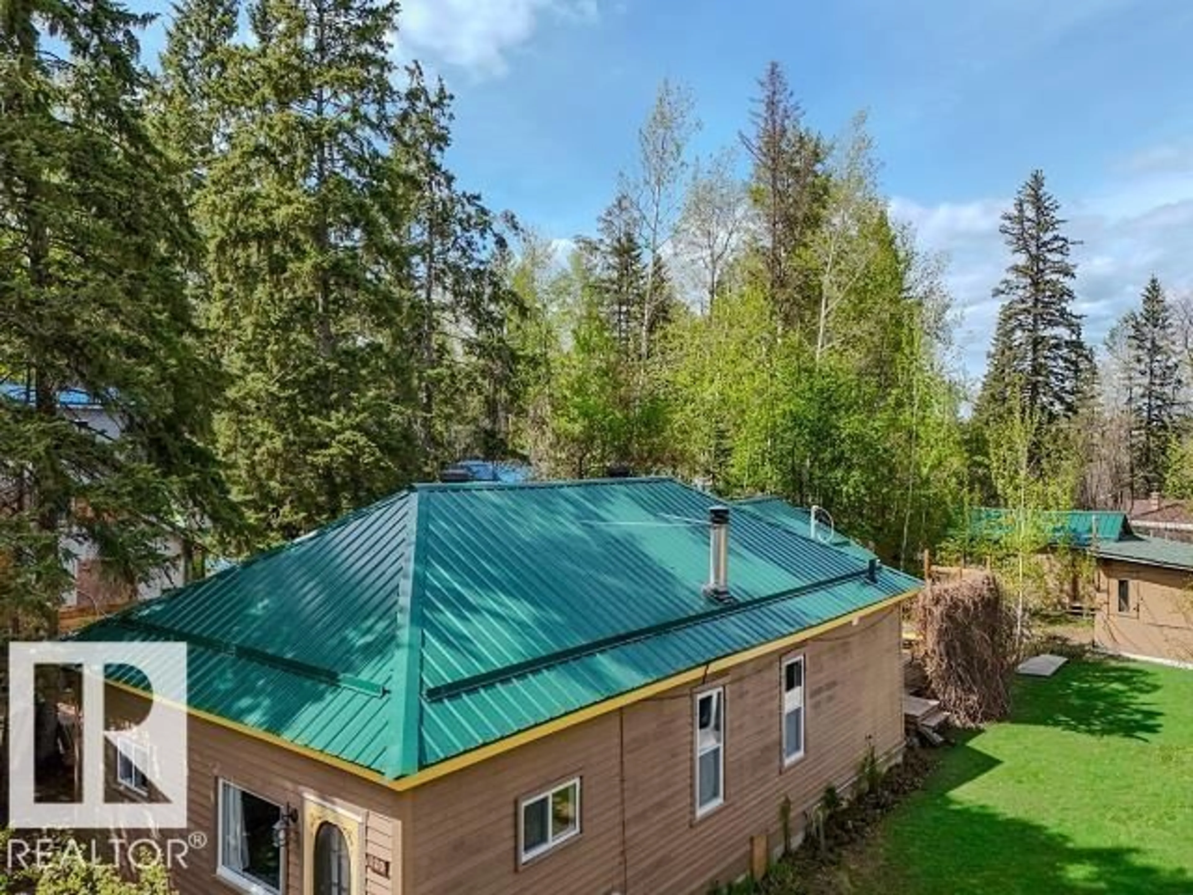 A pic from outside/outdoor area/front of a property/back of a property/a pic from drone, forest/trees view for 120 7 ST, Rural Parkland County Alberta T2B0B0