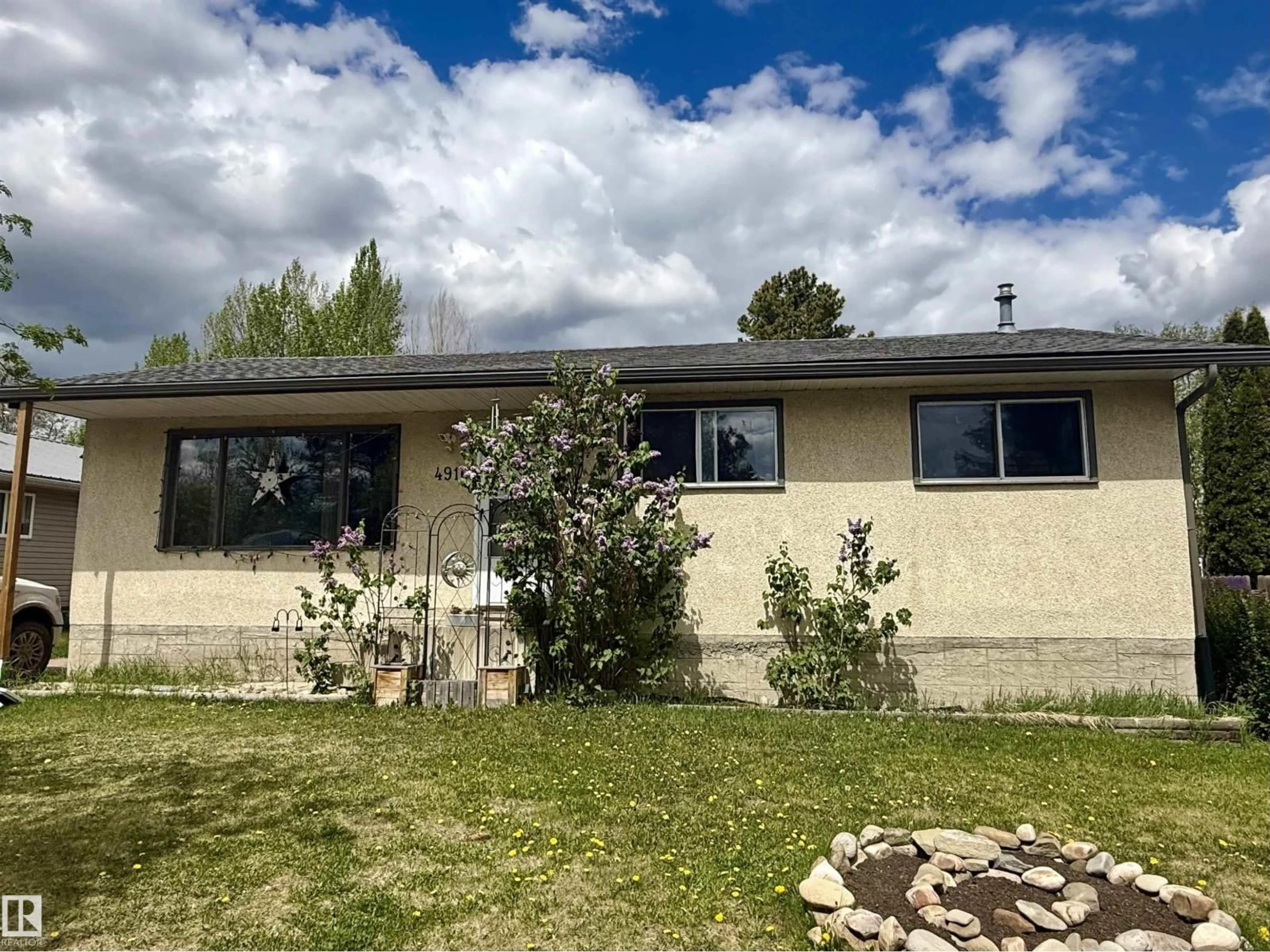 A pic from outside/outdoor area/front of a property/back of a property/a pic from drone, unknown for 4916 54A AV, Drayton Valley Alberta T7A1A3