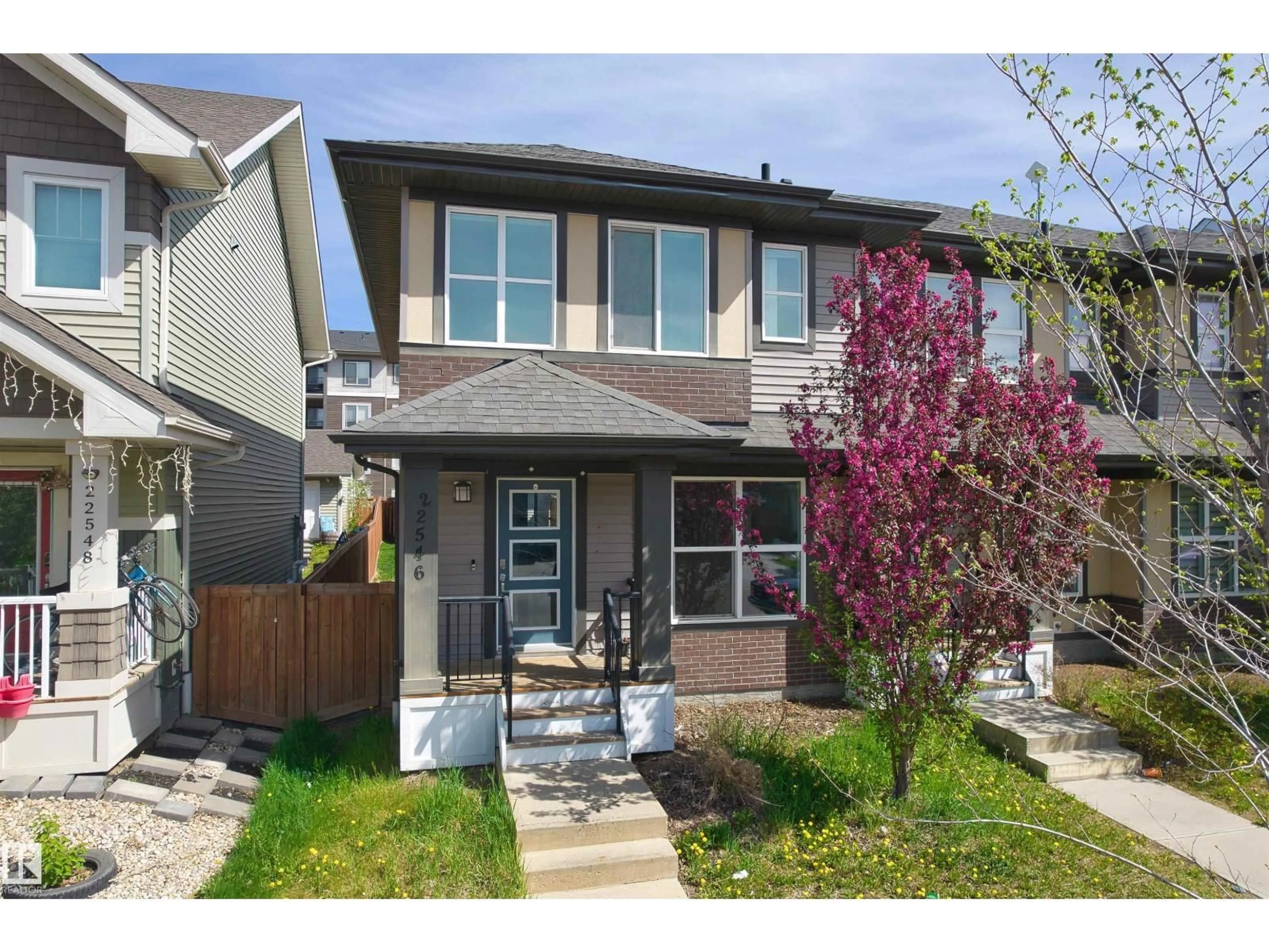 Home with vinyl exterior material, street for 22546 96 AV, Edmonton Alberta T5T7K4