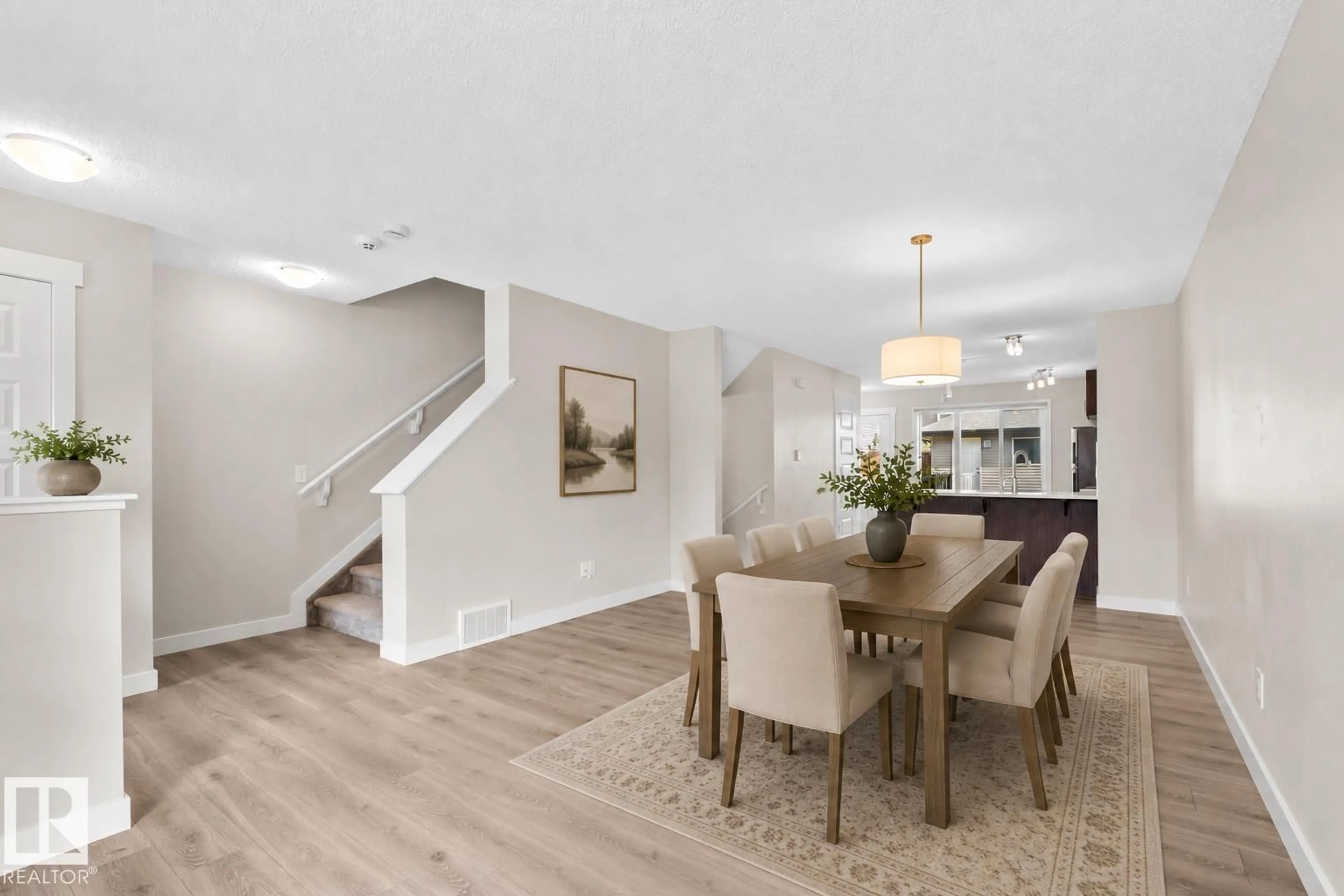 Dining room, wood/laminate floor for 22546 96 AV, Edmonton Alberta T5T7K4