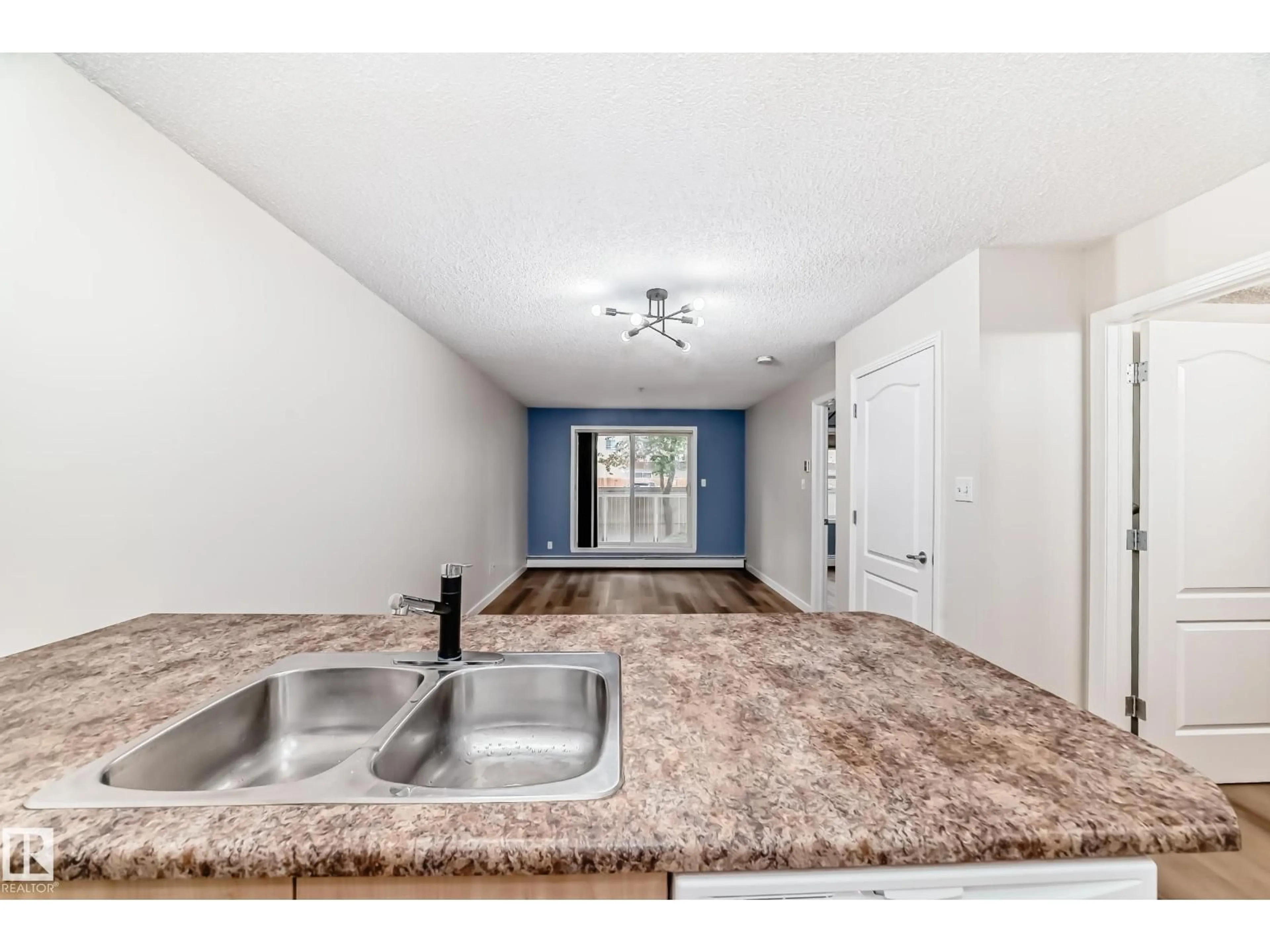 Open concept kitchen, unknown for #108 - 12838 65 ST, Edmonton Alberta T5A5H3