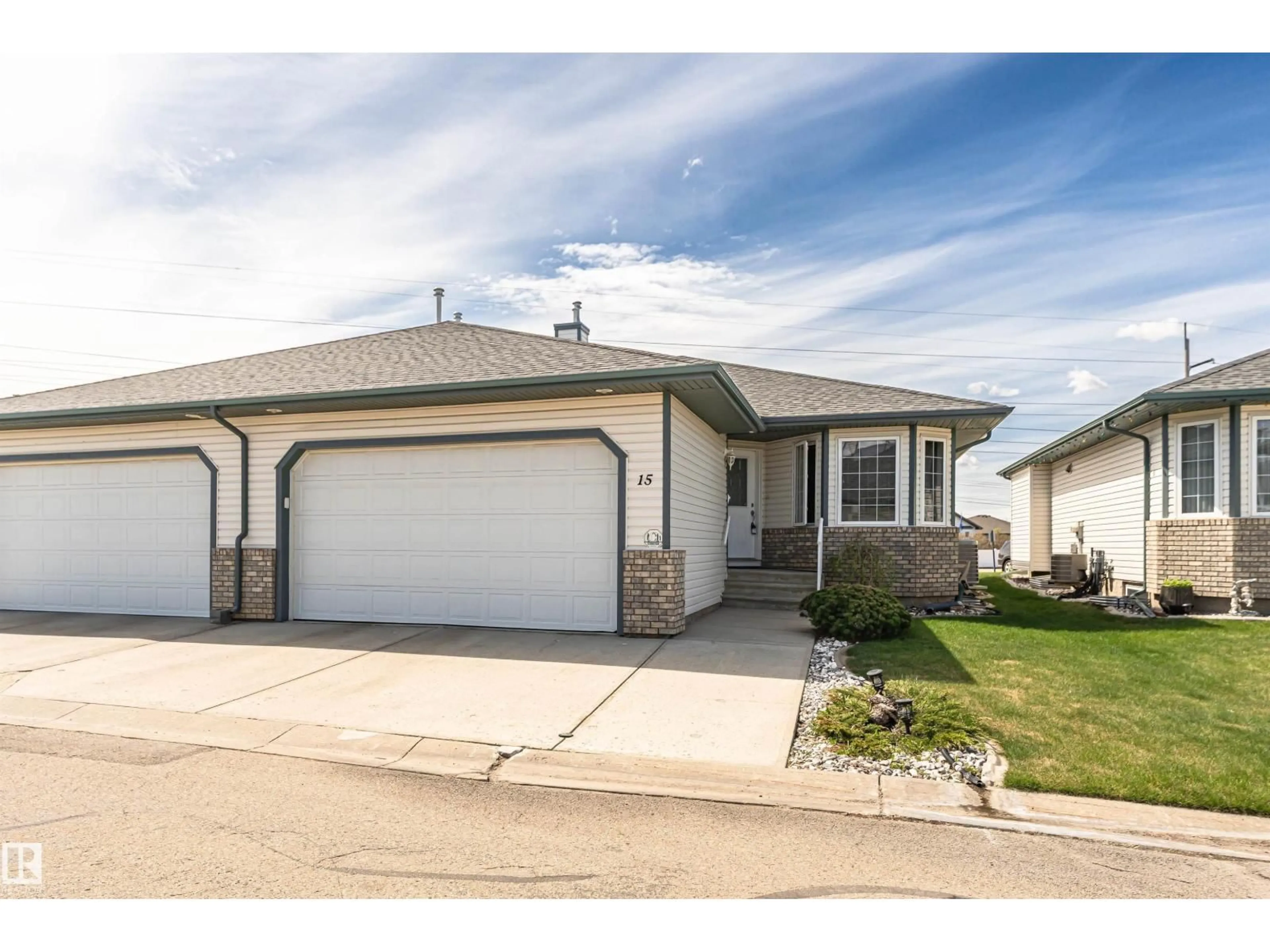 Home with vinyl exterior material, street for #15 - 16415 77 ST, Edmonton Alberta T5Z3S8