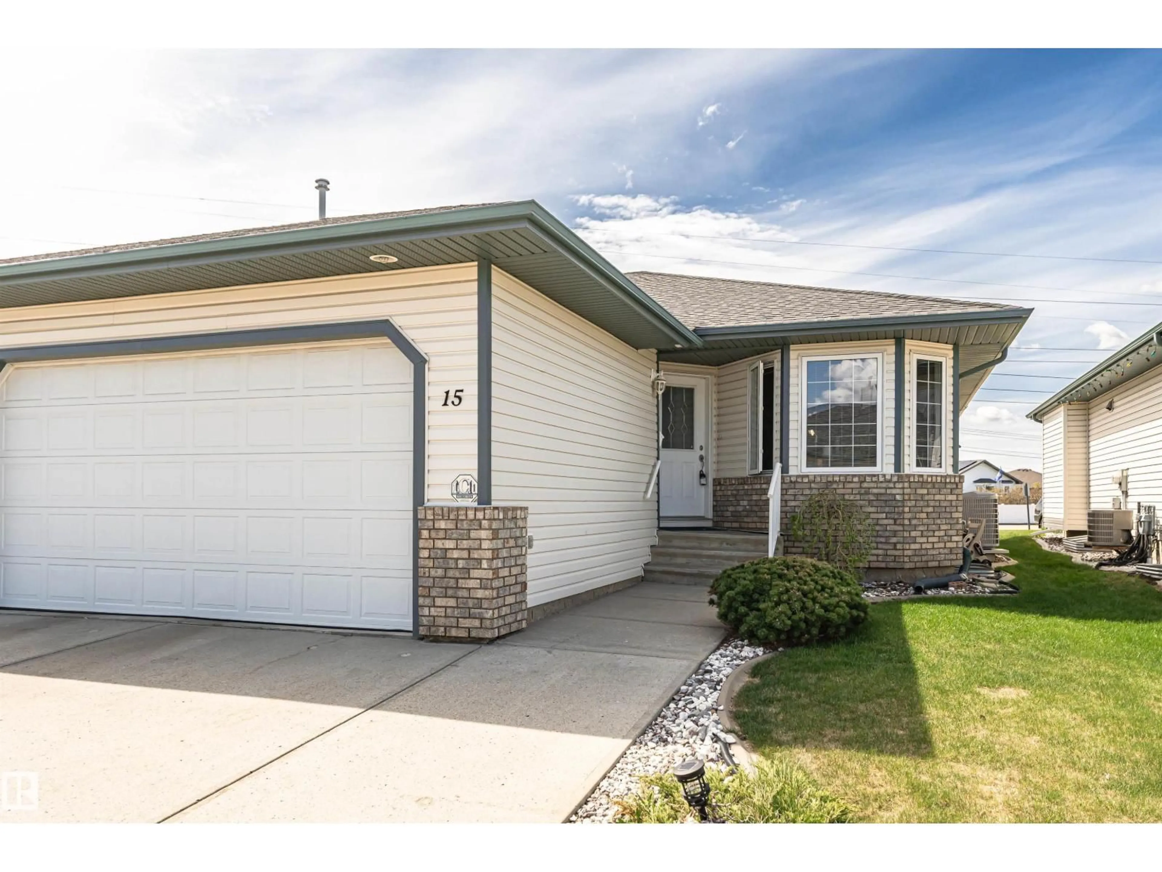 Home with vinyl exterior material, street for #15 - 16415 77 ST, Edmonton Alberta T5Z3S8