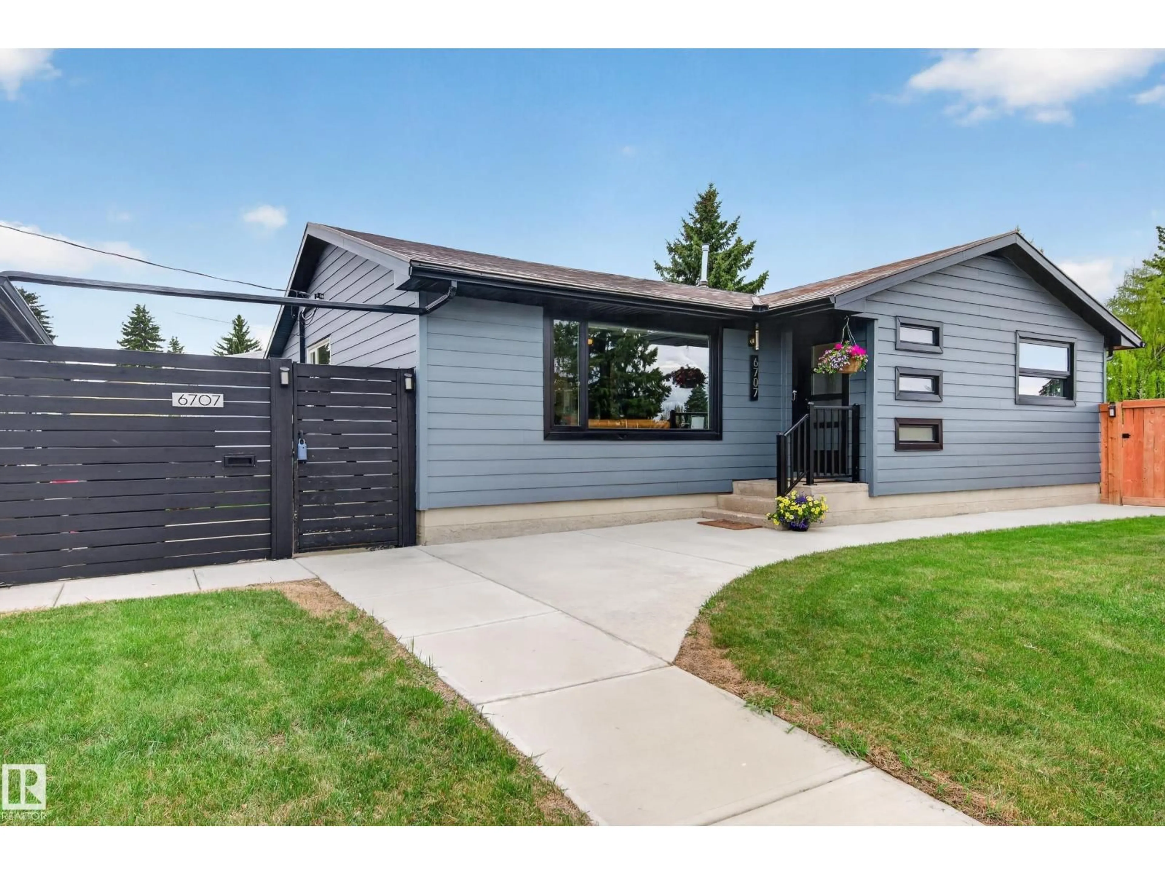 Home with vinyl exterior material, street for NW - 6707 92B AV, Edmonton Alberta T6B0V8