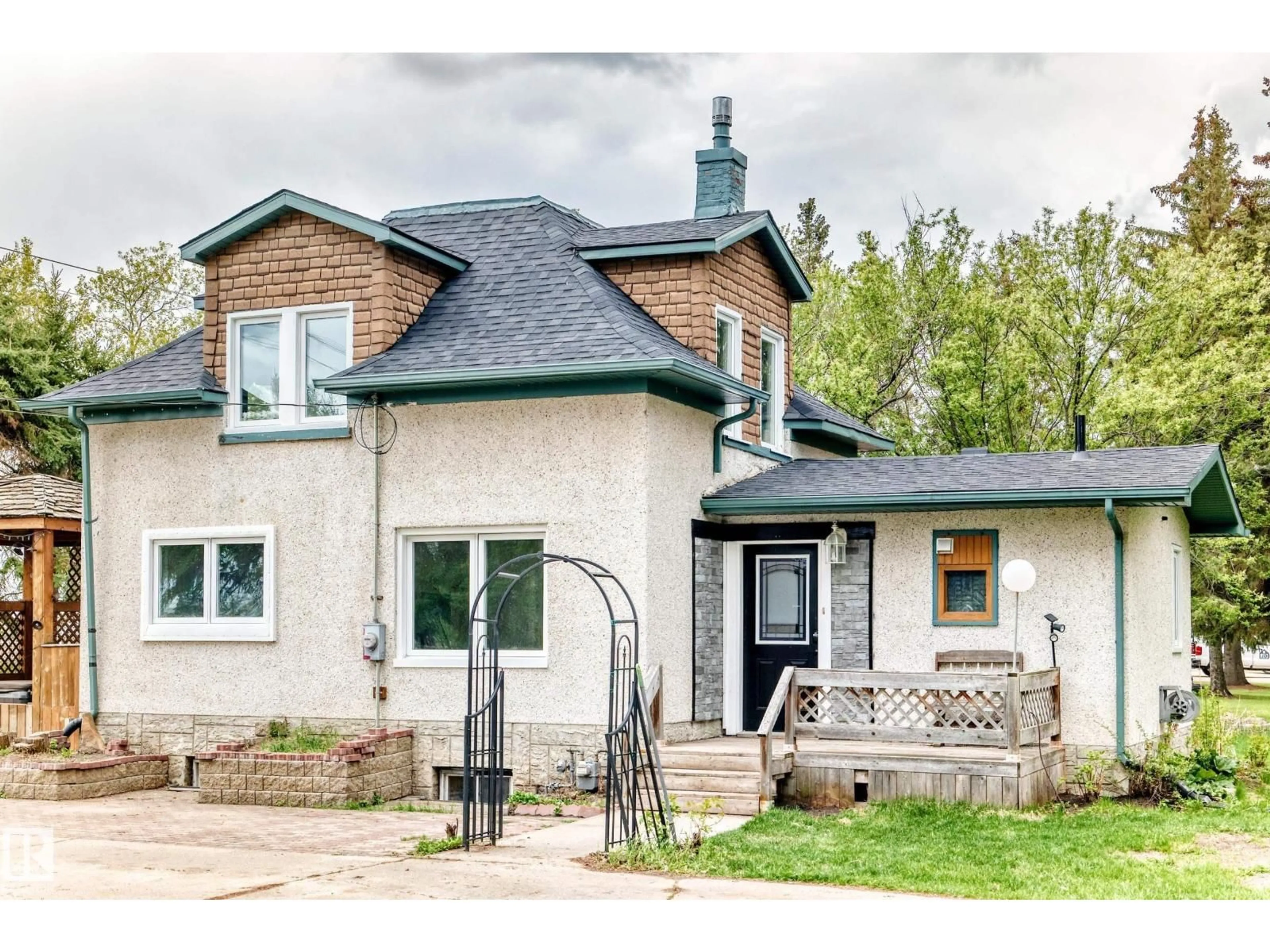 Home with brick exterior material, street for 21252 TWP ROAD 550, Rural Strathcona County Alberta T8L4B8