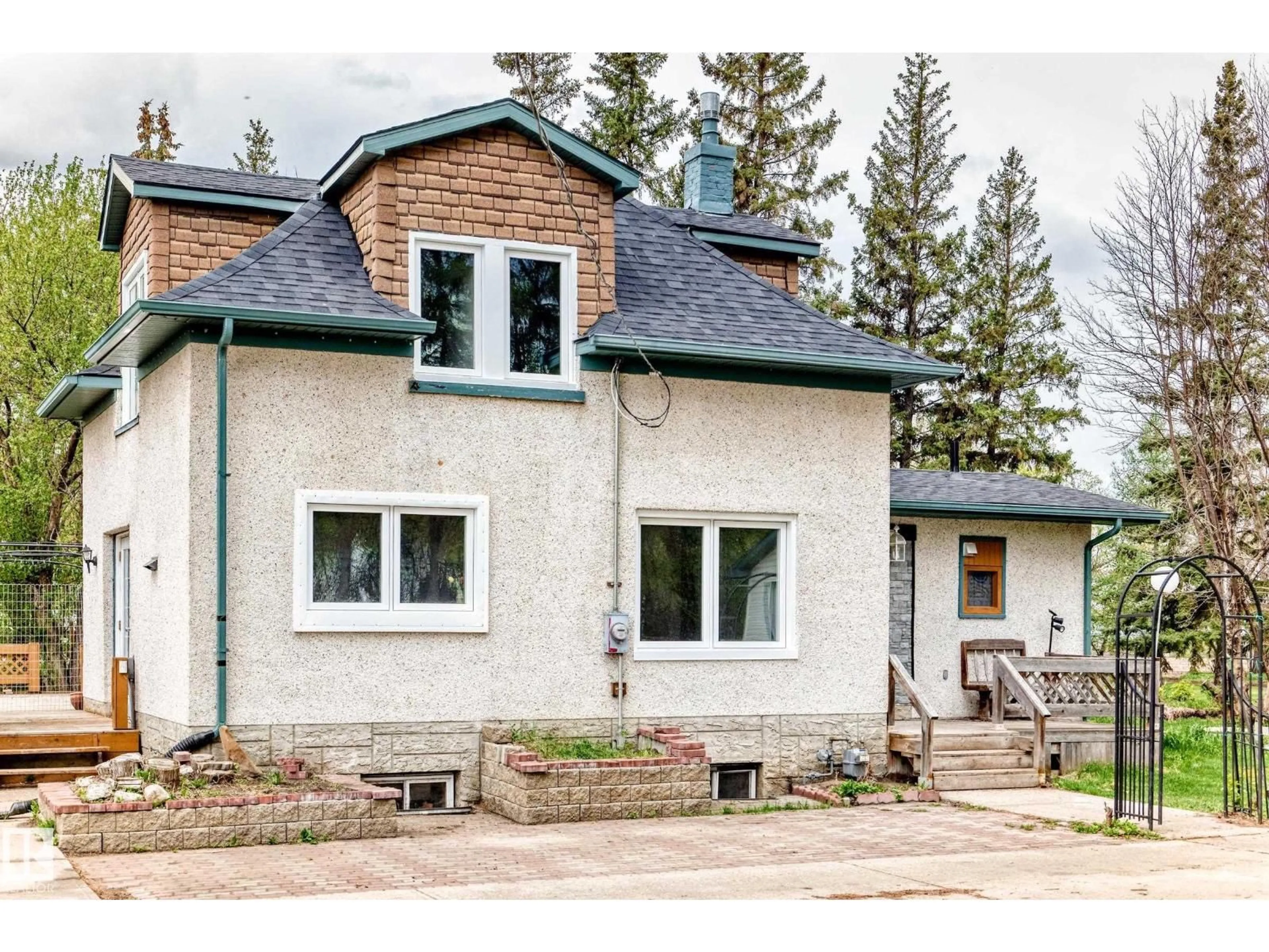 Home with brick exterior material, street for 21252 TWP ROAD 550, Rural Strathcona County Alberta T8L4B8