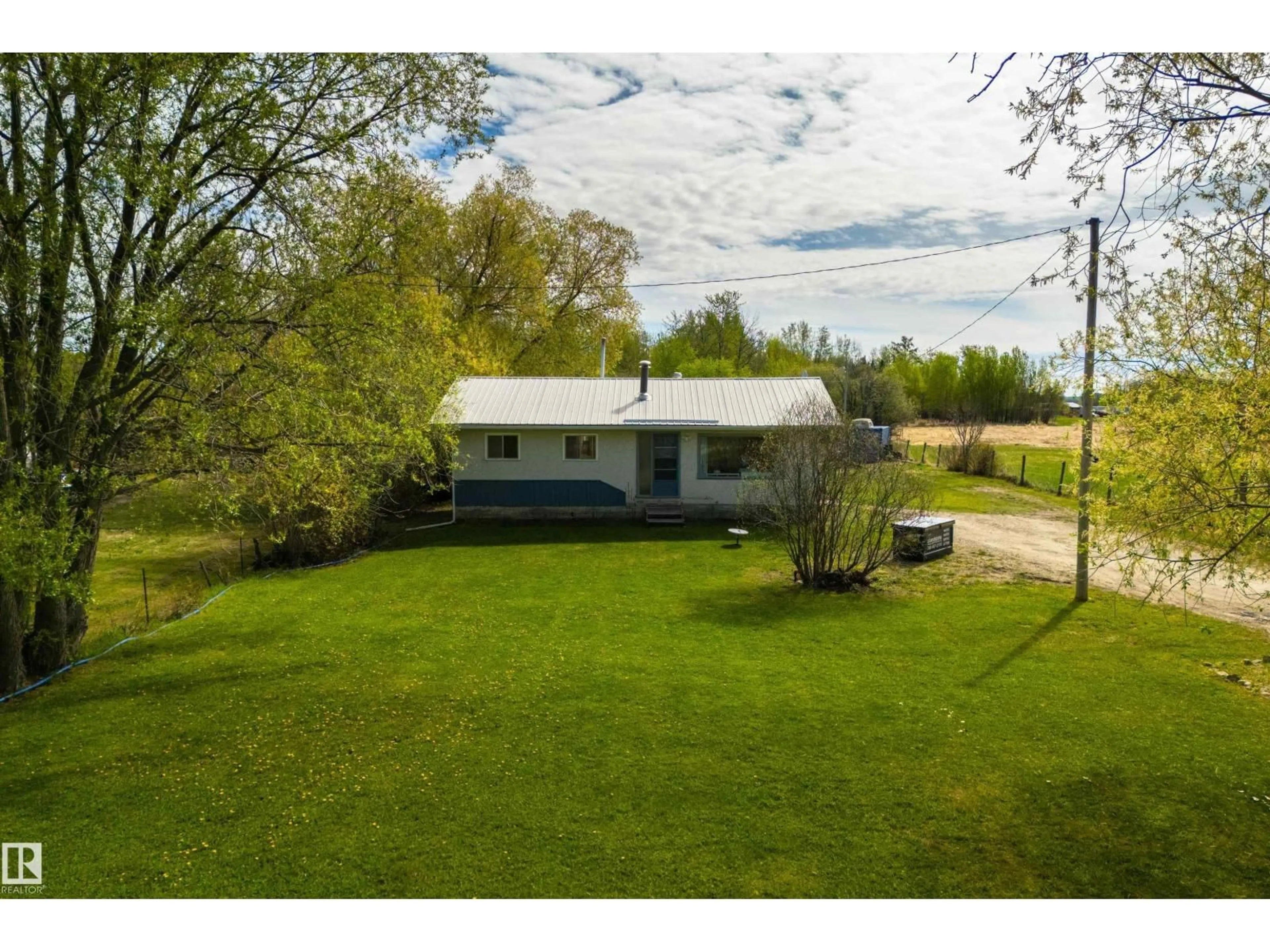 A pic from outside/outdoor area/front of a property/back of a property/a pic from drone, water/lake/river/ocean view for 53031 RGE ROAD 43, Rural Parkland County Alberta T0E2K0