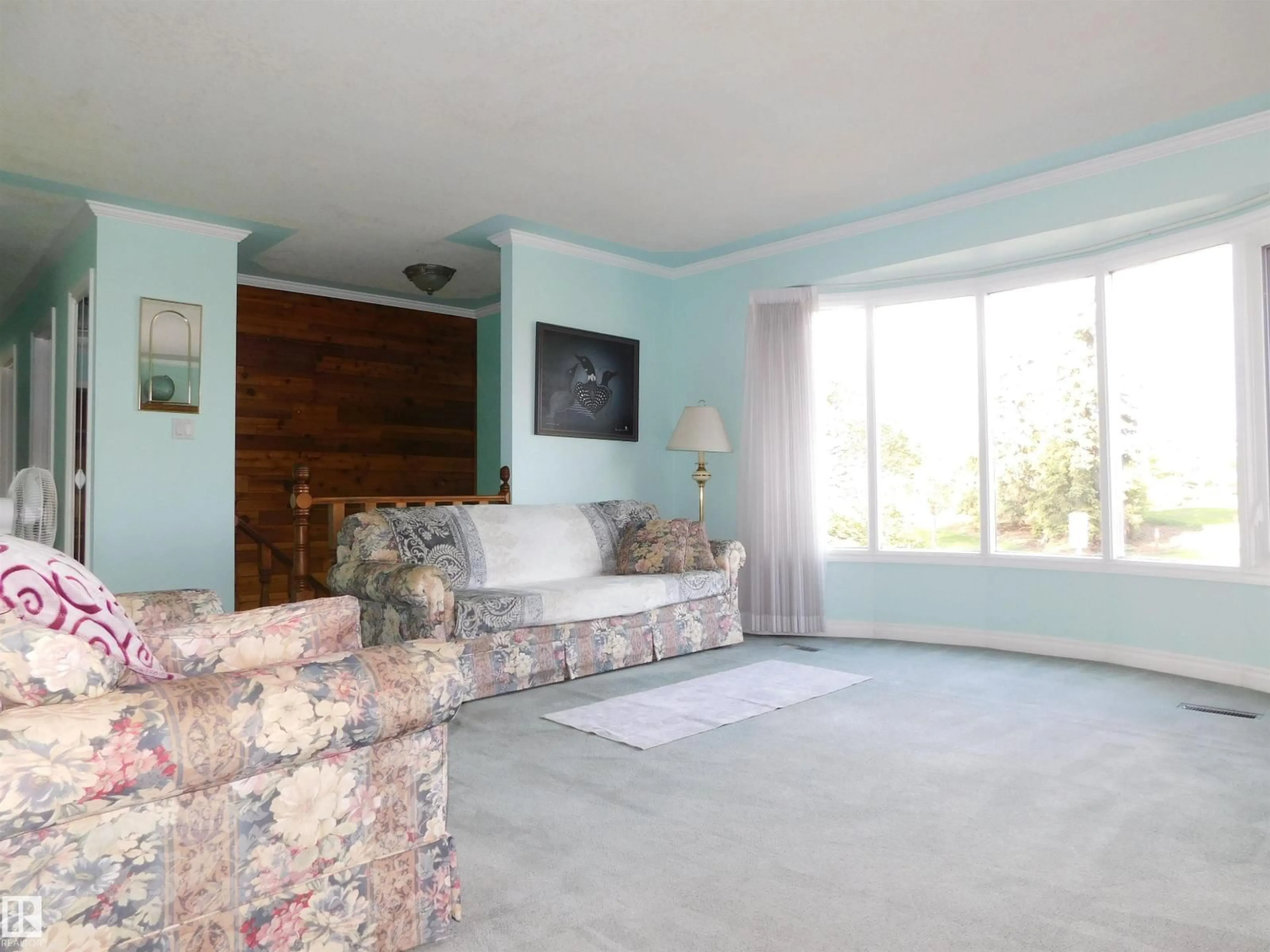 Living room with furniture, unknown for 10908 30 ST, Edmonton Alberta T5W1V9