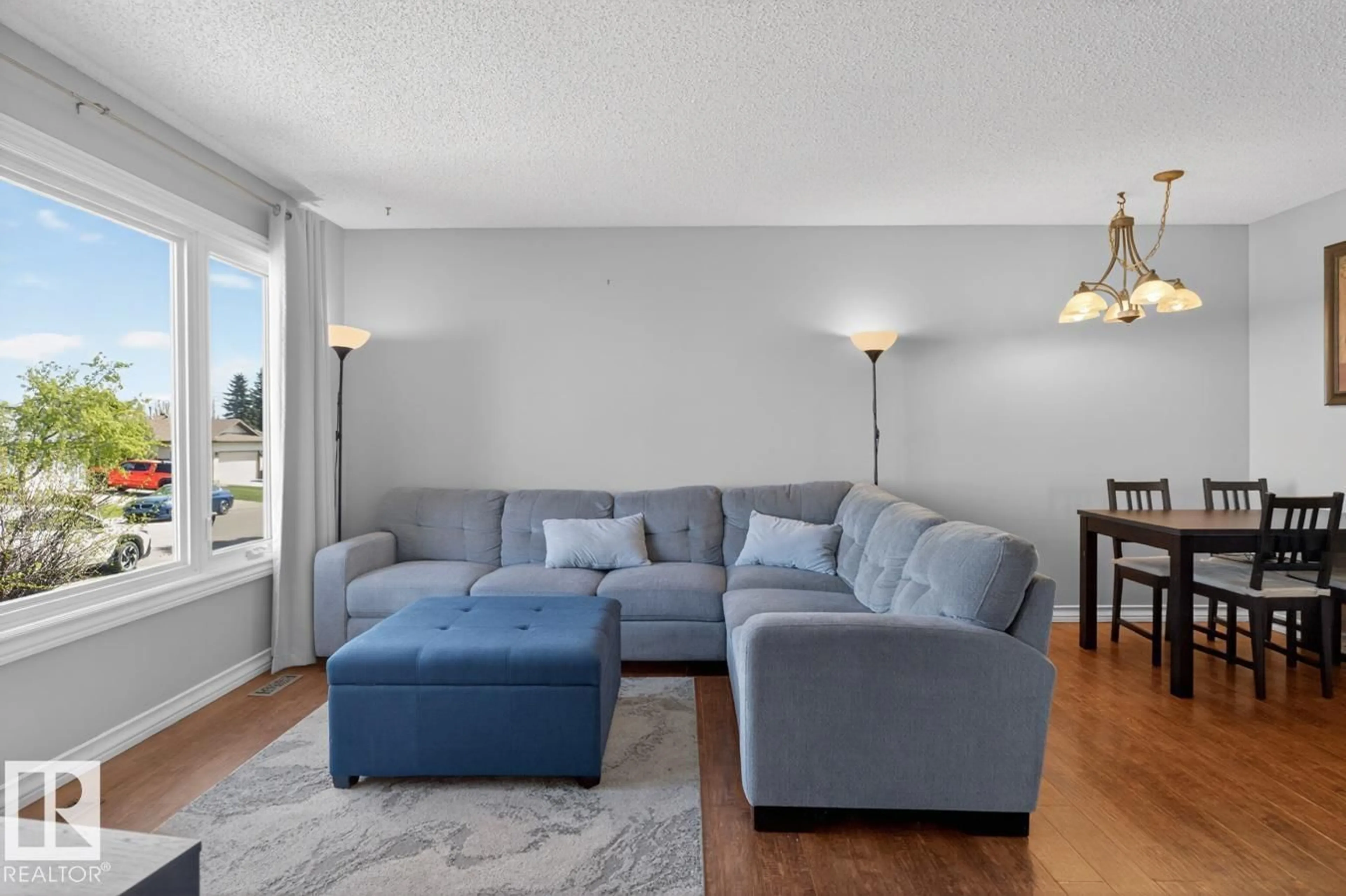 Living room with furniture, unknown for 18655 61 AV, Edmonton Alberta T6M2B3