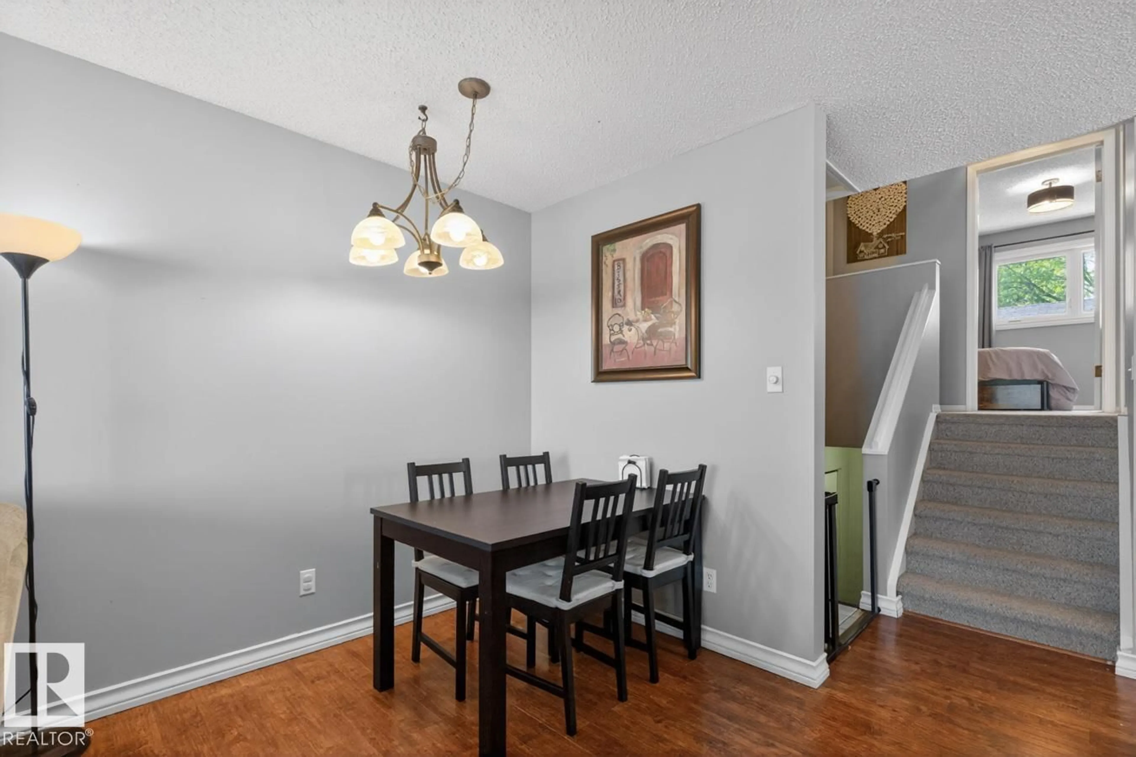 Dining room, wood/laminate floor for 18655 61 AV, Edmonton Alberta T6M2B3
