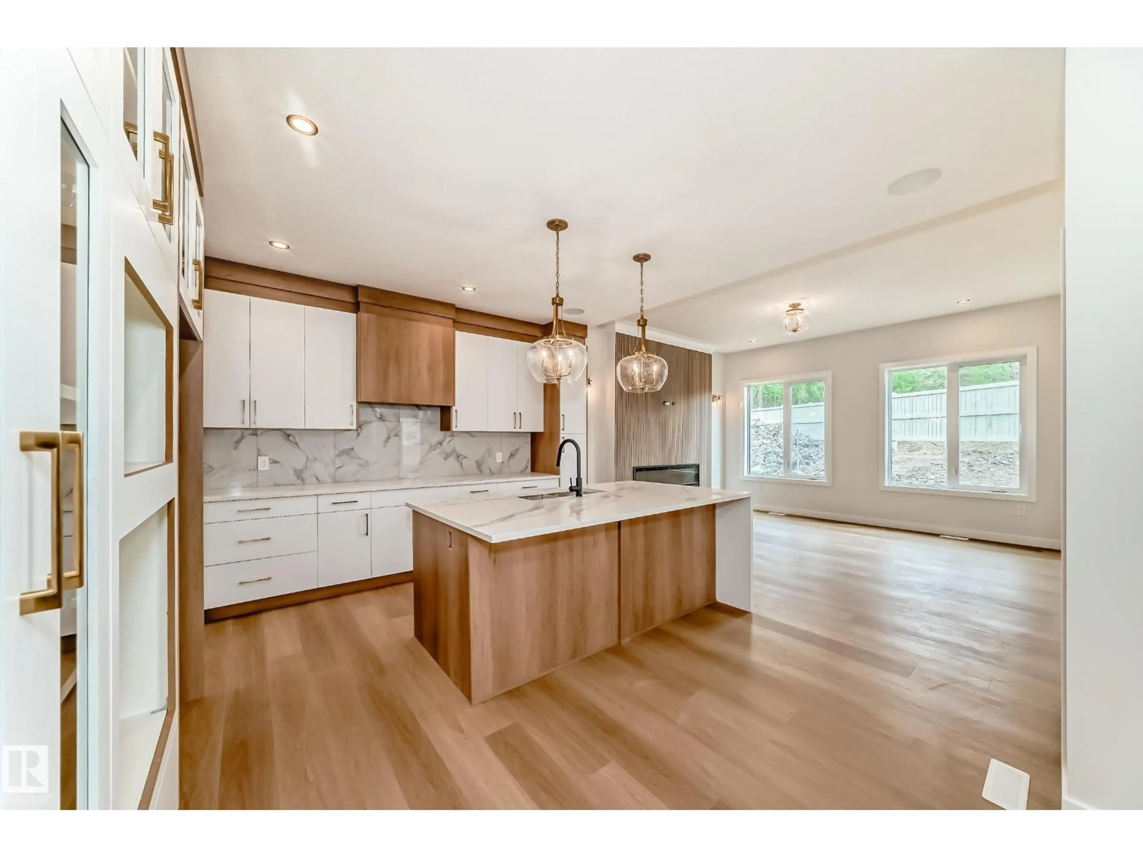 Open concept kitchen, wood/laminate floor for 47 MEADOWGROVE LN, Spruce Grove Alberta T7X0W2