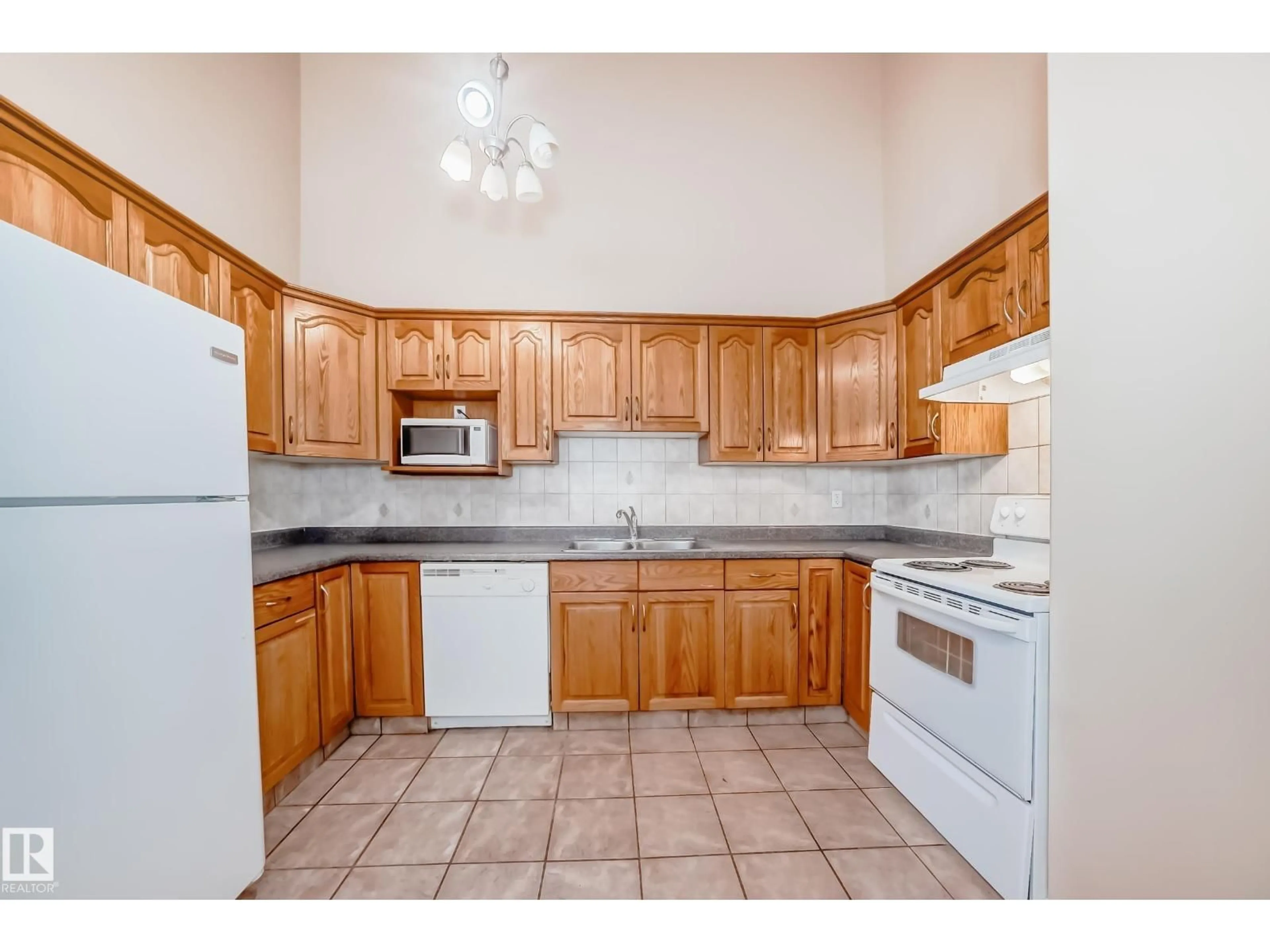 Standard kitchen, ceramic/tile floor for 9825 156 ST, Edmonton Alberta T5P2P2