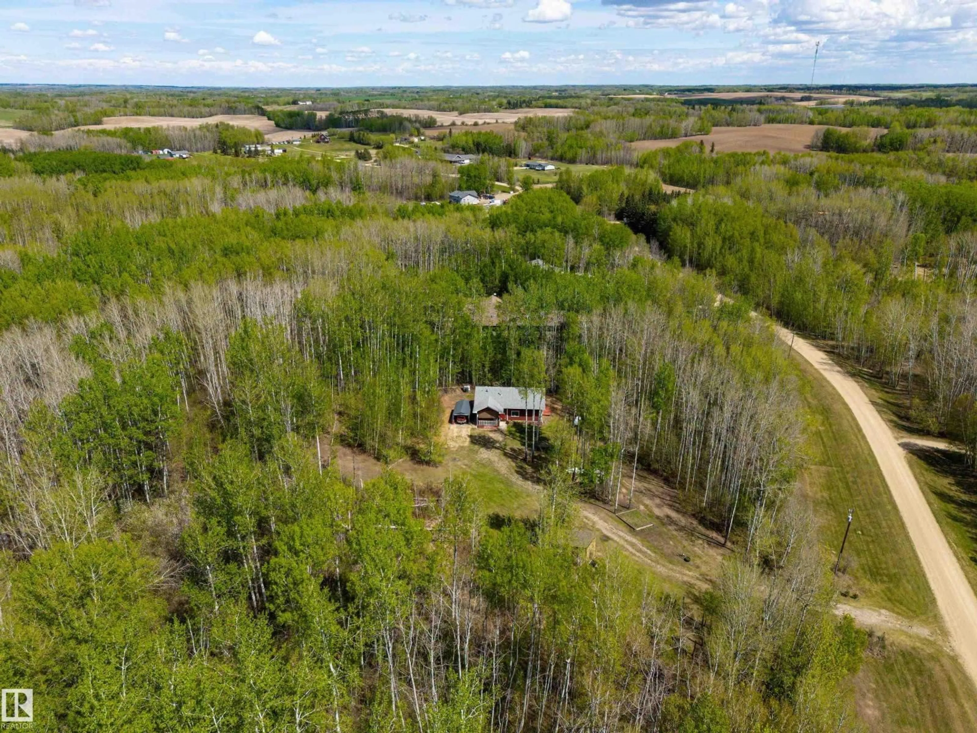A pic from outside/outdoor area/front of a property/back of a property/a pic from drone, forest/trees view for 36 52229 RGE ROAD 25, Rural Parkland County Alberta T7Y2M3