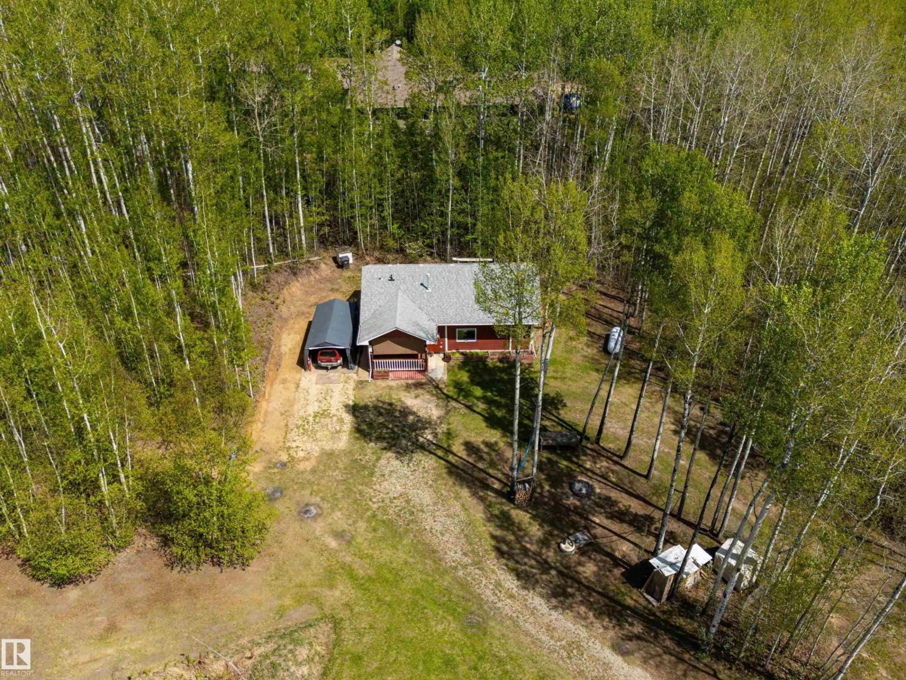 A pic from outside/outdoor area/front of a property/back of a property/a pic from drone, forest/trees view for 36 52229 RGE ROAD 25, Rural Parkland County Alberta T7Y2M3
