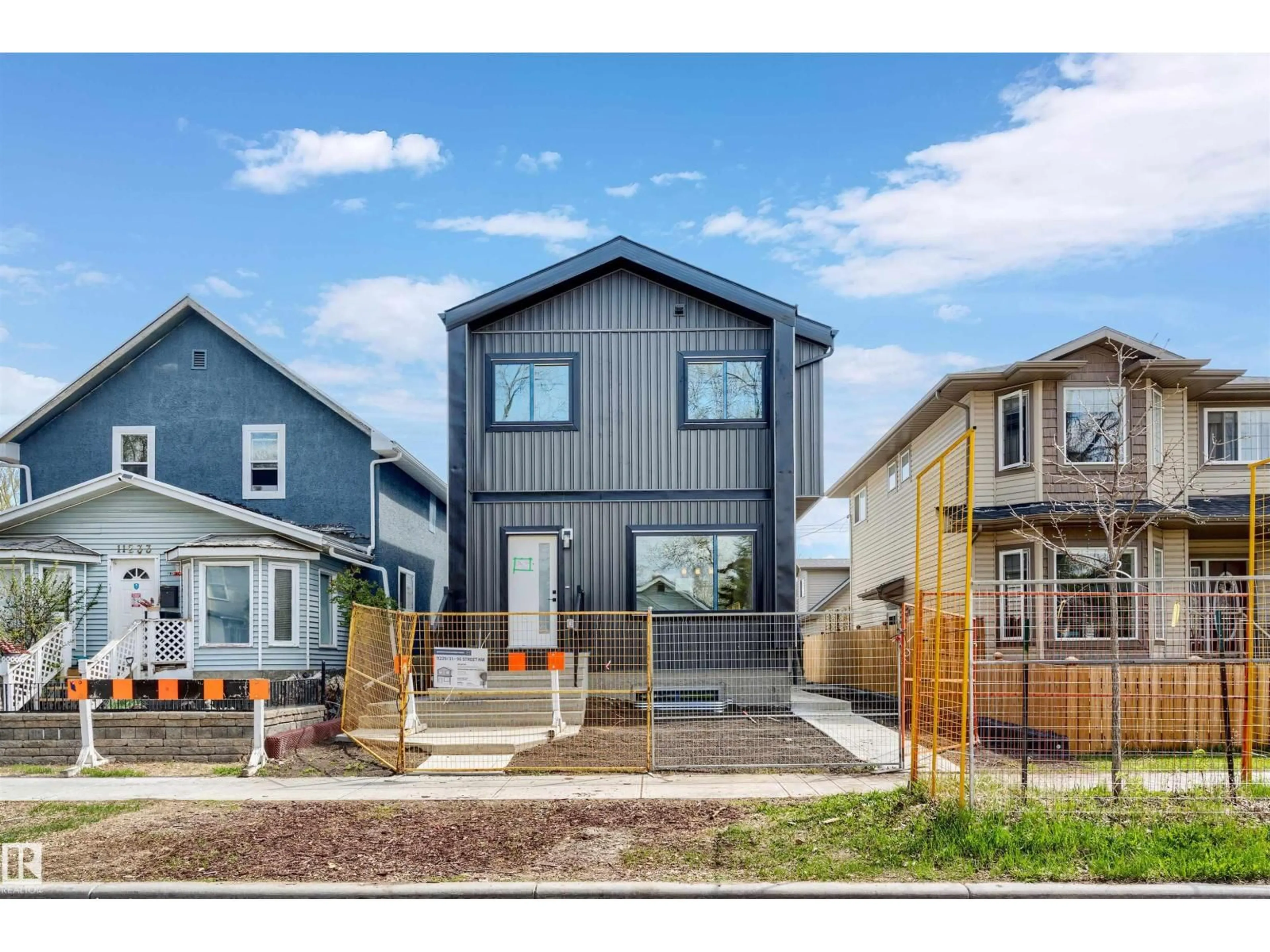 Home with vinyl exterior material, street for 11229 96 STREET, Edmonton Alberta T5T1G1