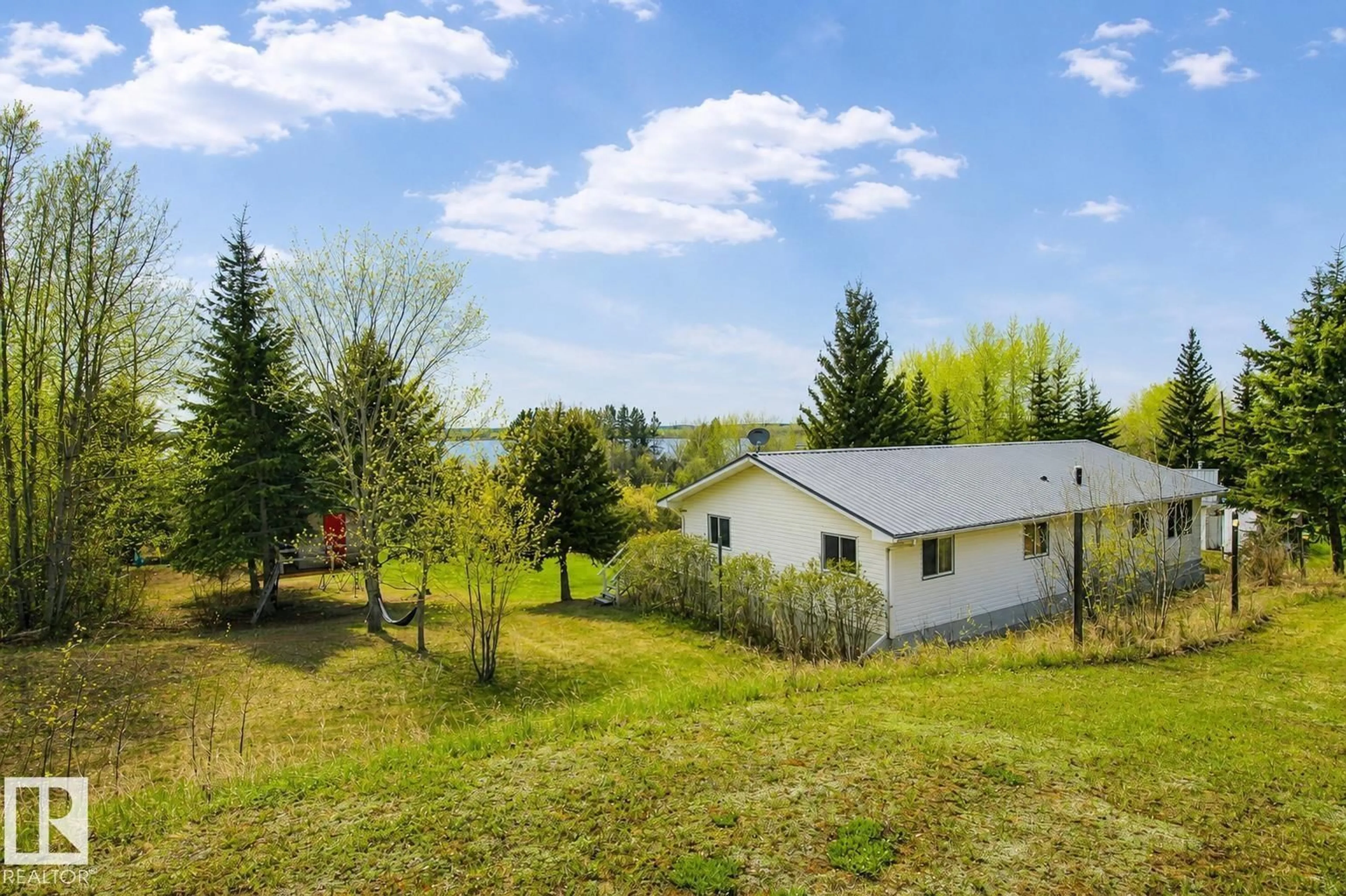 A pic from outside/outdoor area/front of a property/back of a property/a pic from drone, water/lake/river/ocean view for 60245 - 366 RANGE ROAD 164, Rural Smoky Lake County Alberta T0A3C0