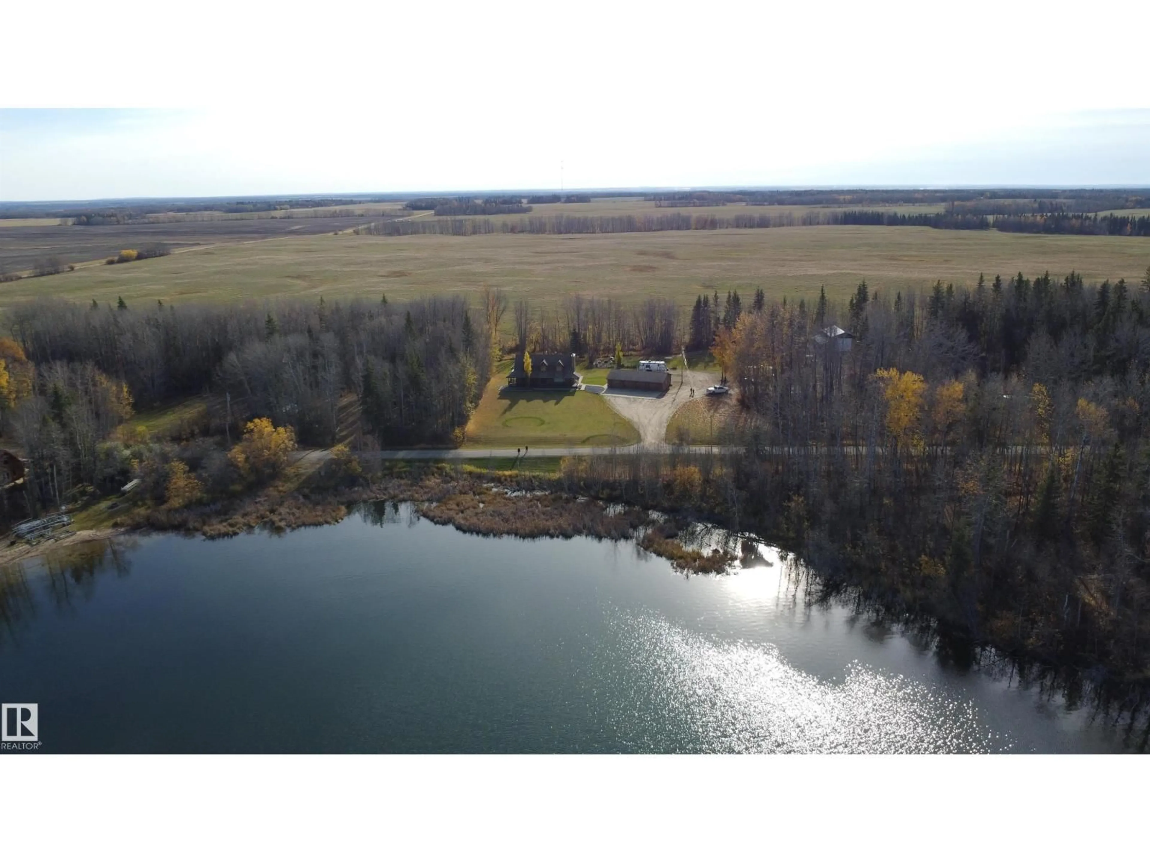 A pic from outside/outdoor area/front of a property/back of a property/a pic from drone, water/lake/river/ocean view for 8 SUNRISE DR, Rural Westlock County Alberta T0G0S0