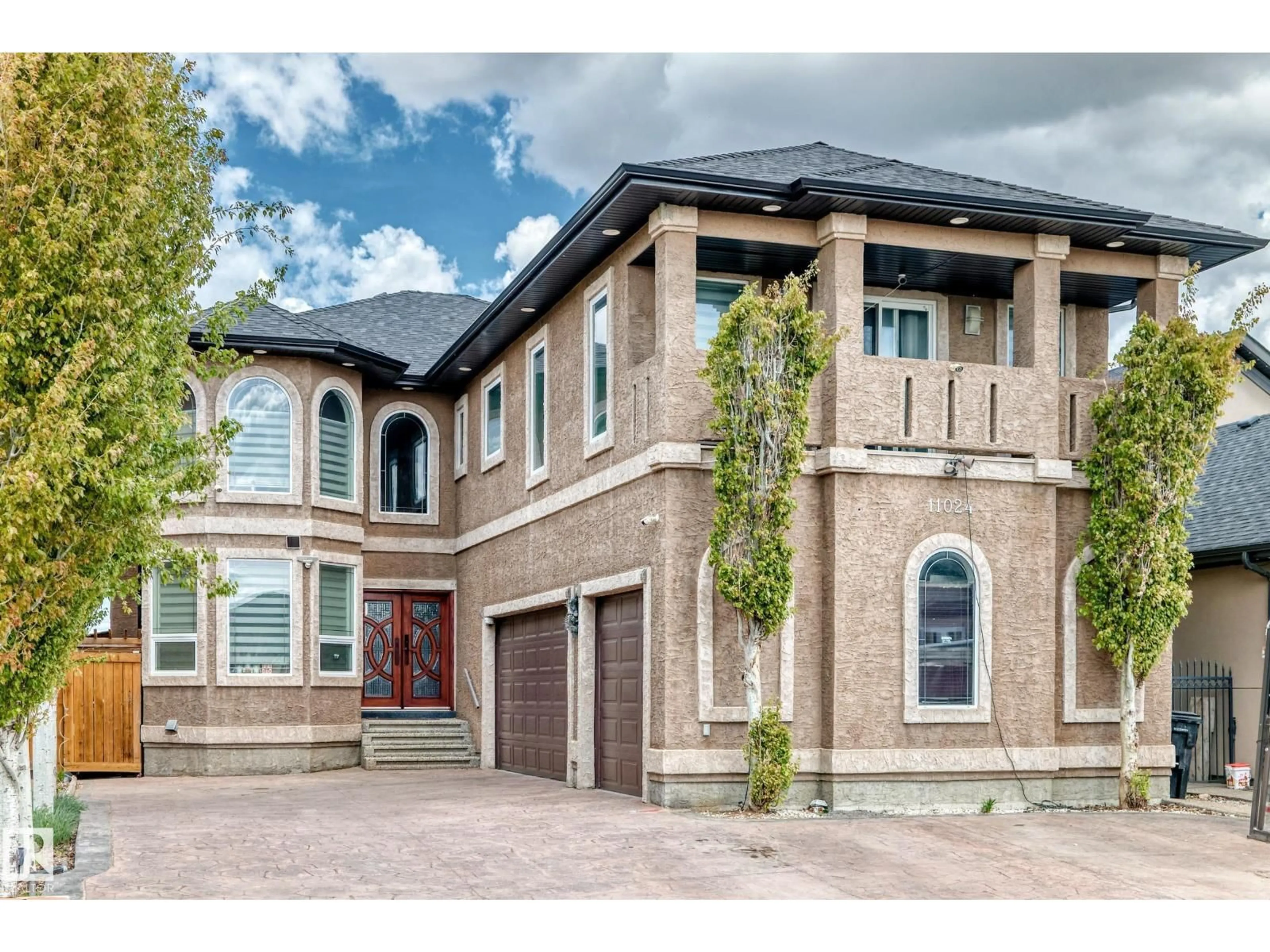 Home with brick exterior material, street for 11024 179 AV, Edmonton Alberta T5X6J3