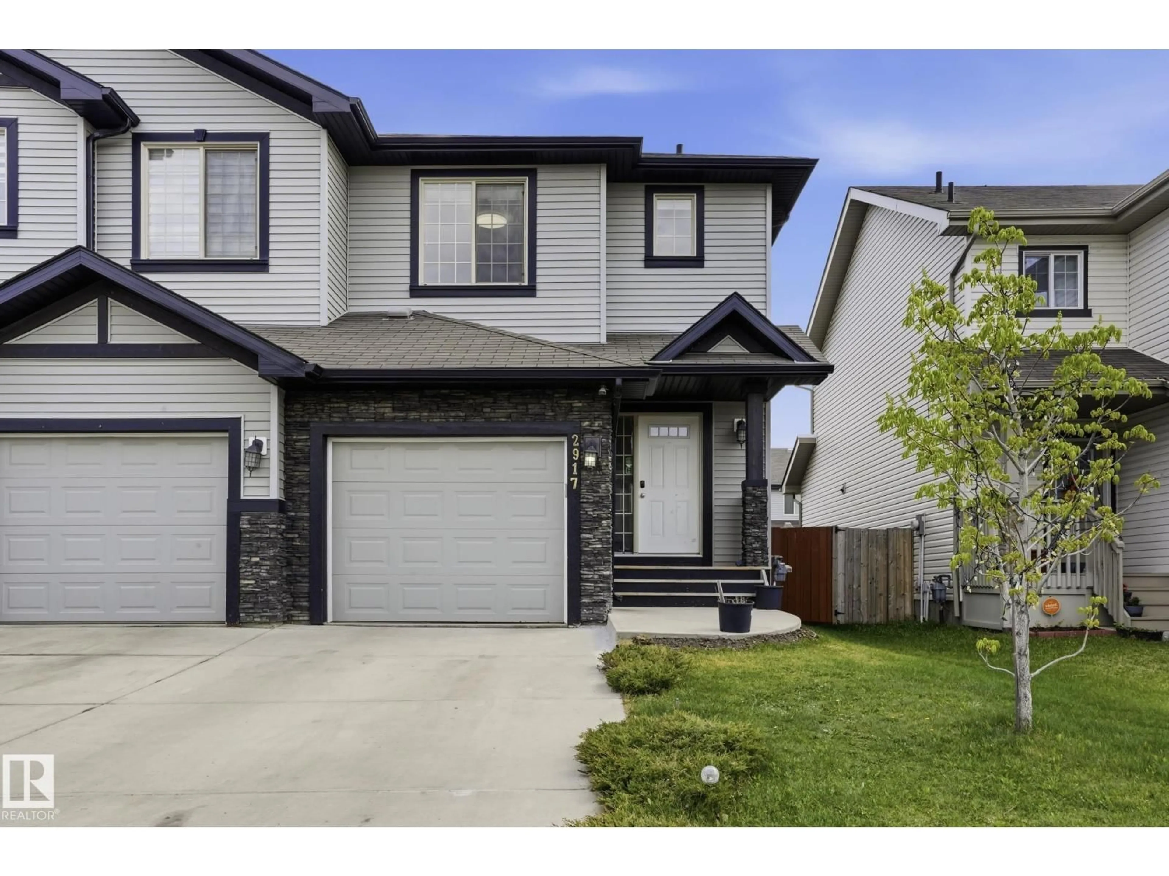 Home with vinyl exterior material, street for 2917 16A AV, Edmonton Alberta T6T0P8